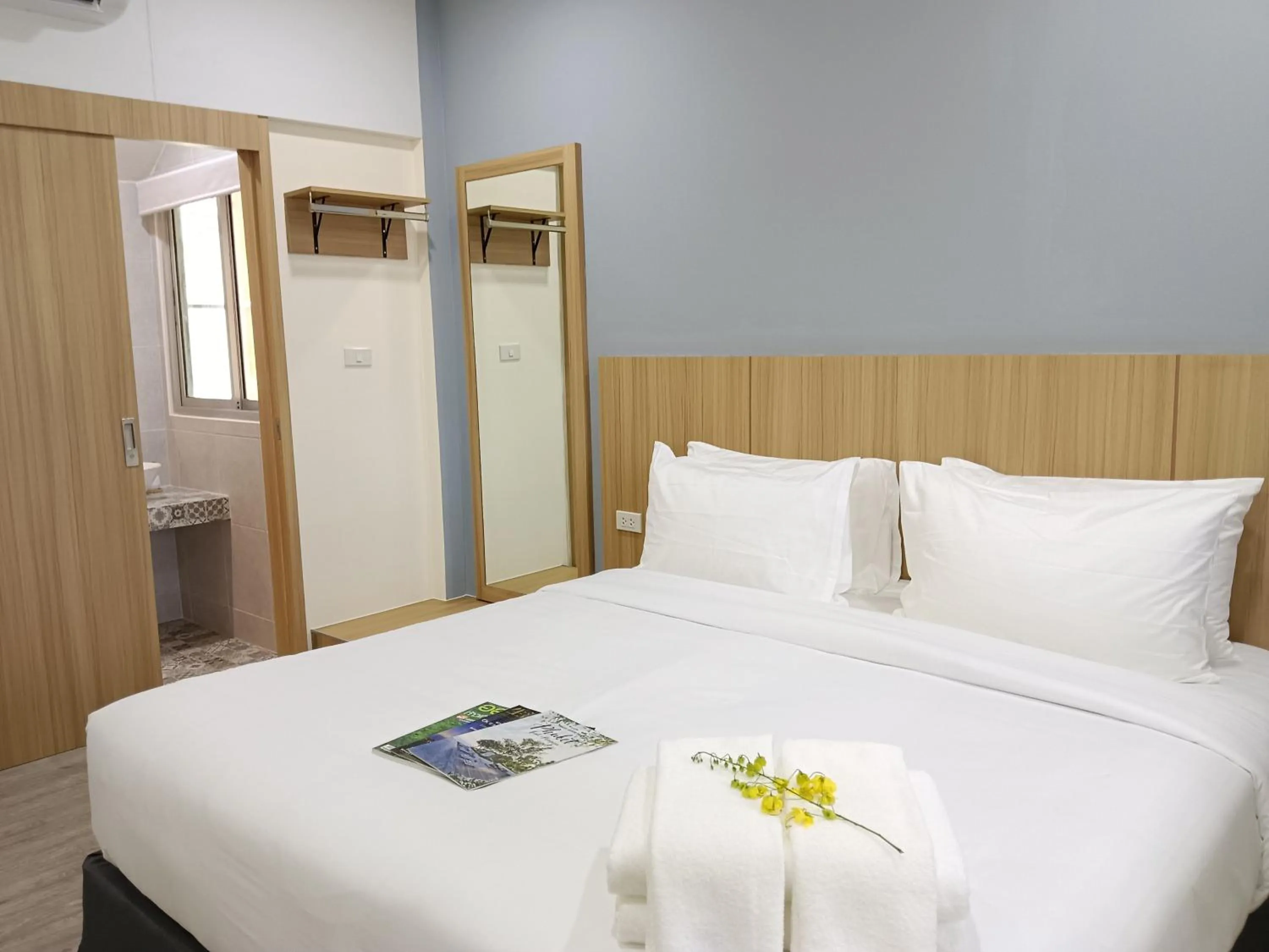 Bed in Beyond 21 Hotel