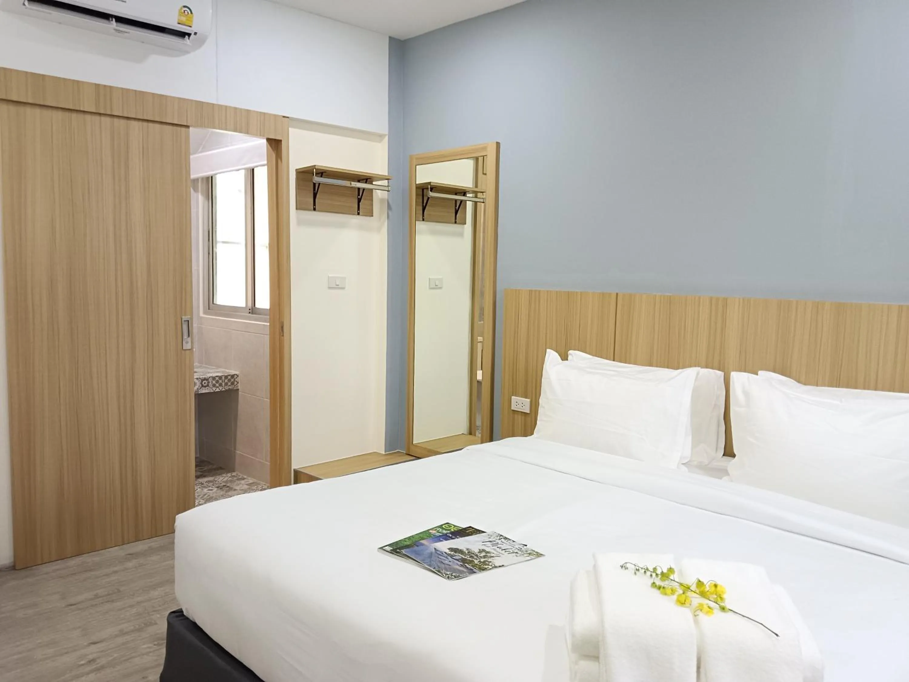 Bed in Beyond 21 Hotel