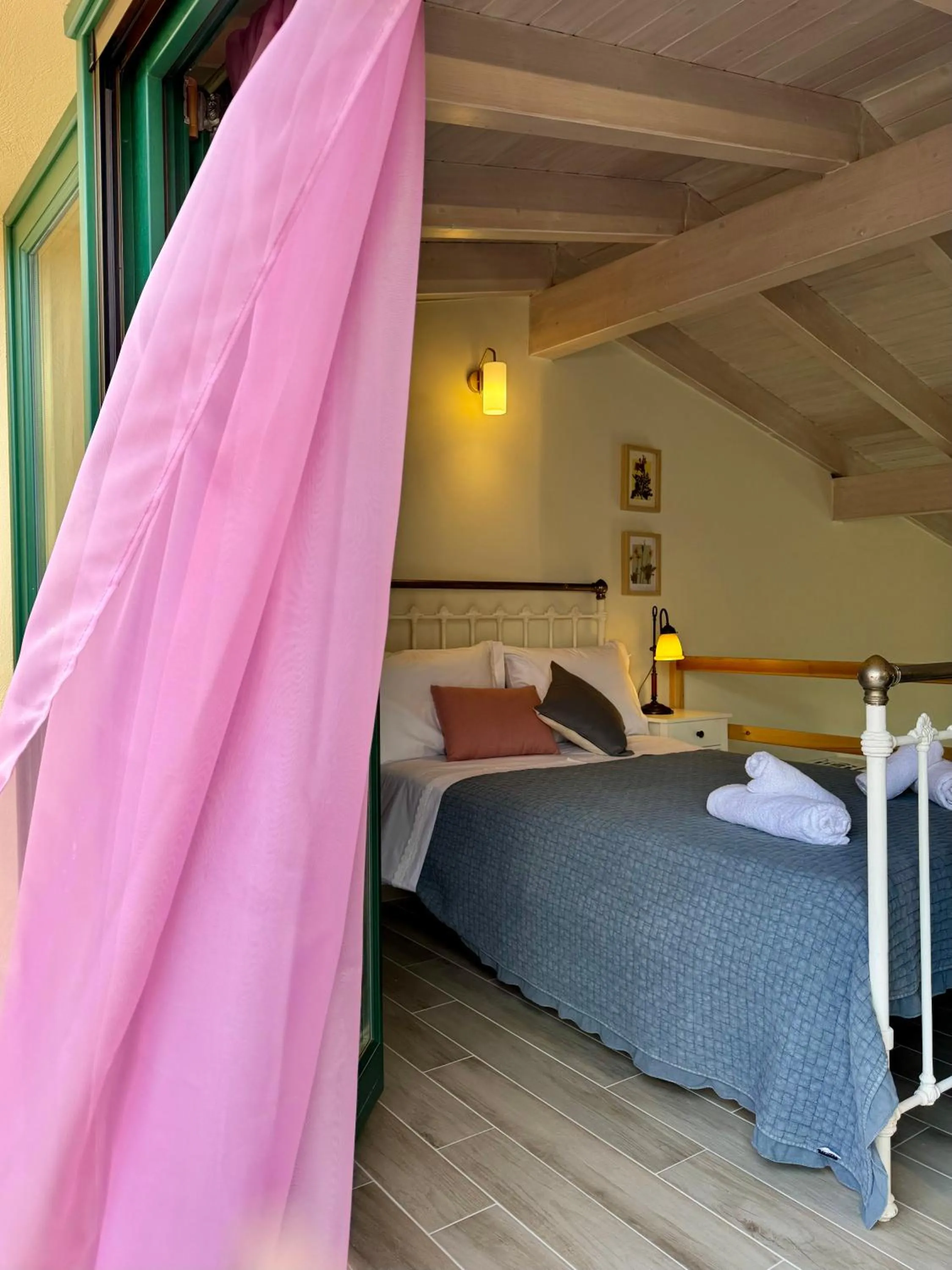 Bed in Apidalos Apartments