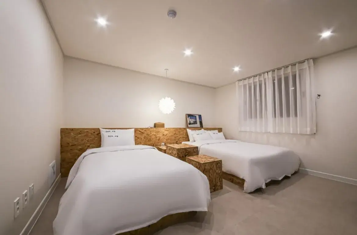 Bed in The First Boutique Hotel Bed in The First Boutique Hotel