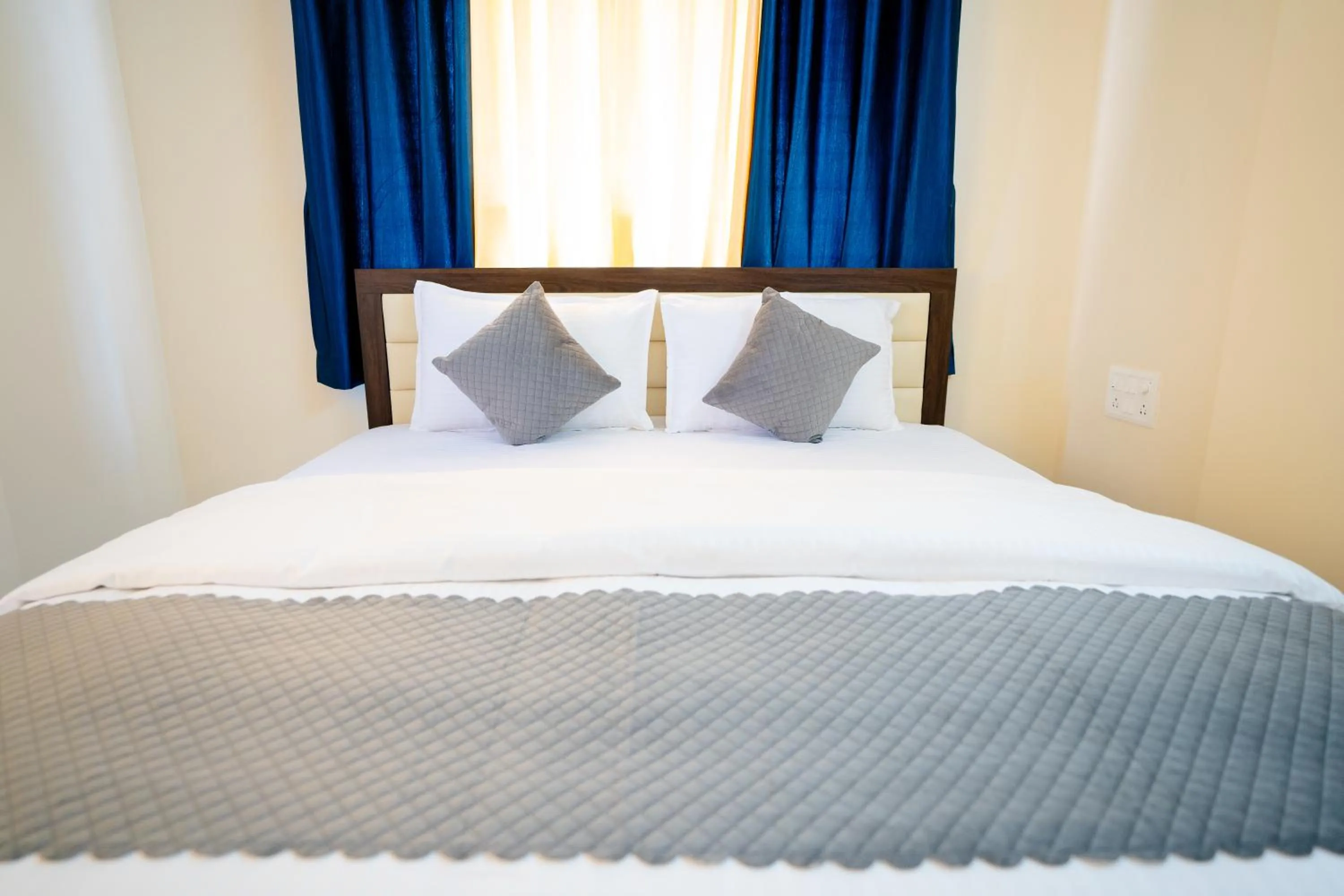 Bed in Elegance Serviced Apartment