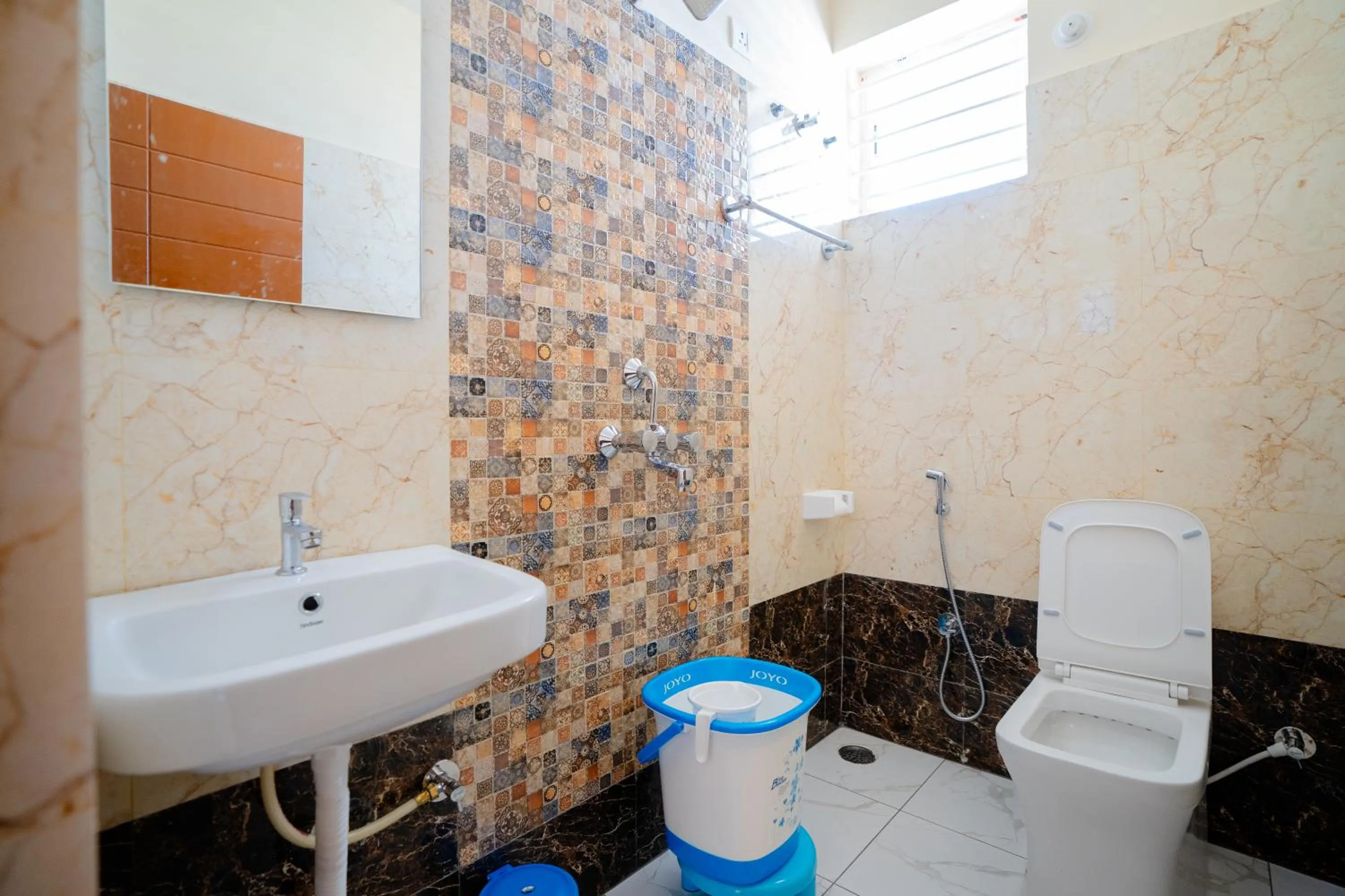 Toilet in Elegance Serviced Apartment