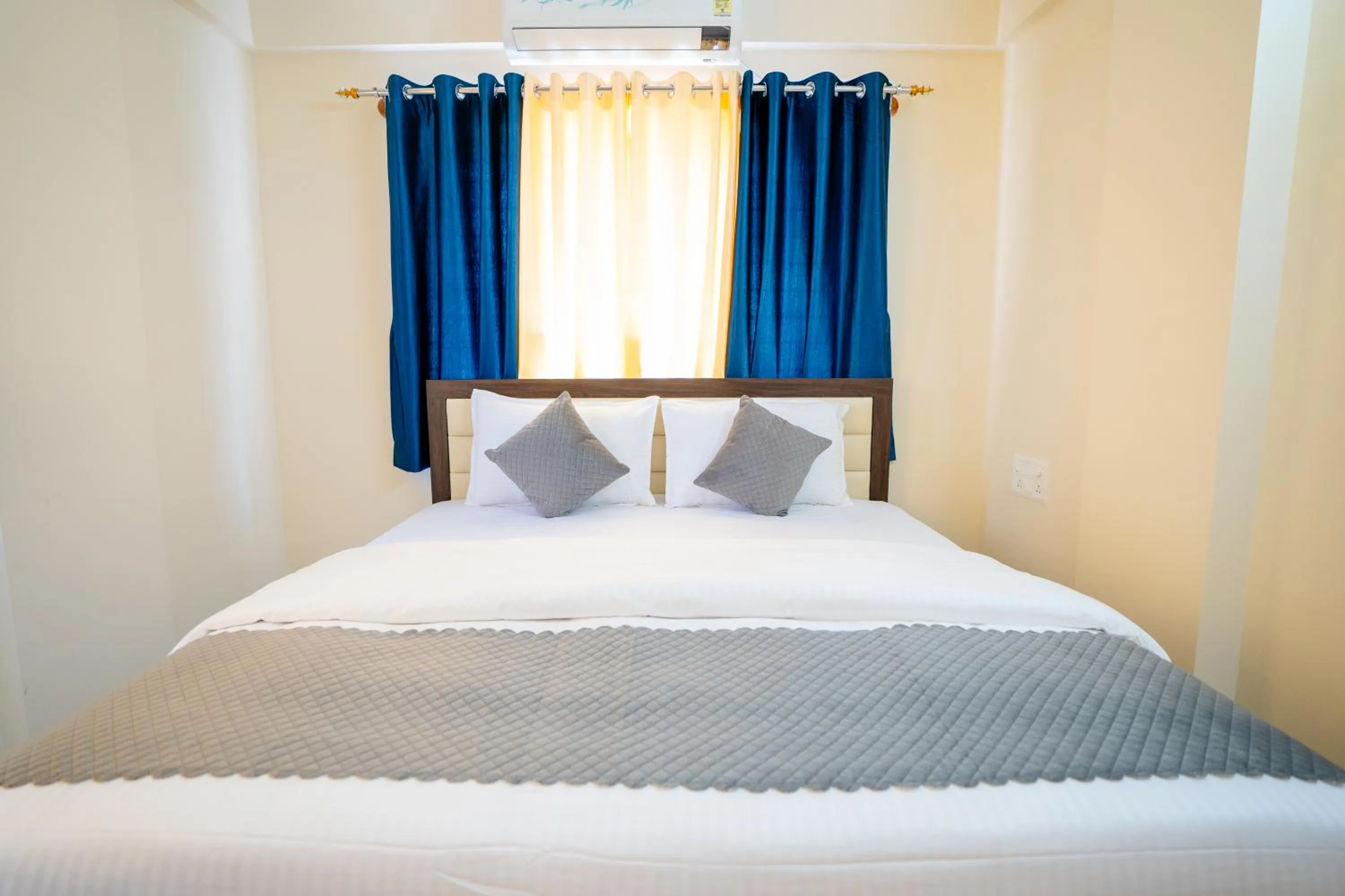 Bed in Elegance Serviced Apartment