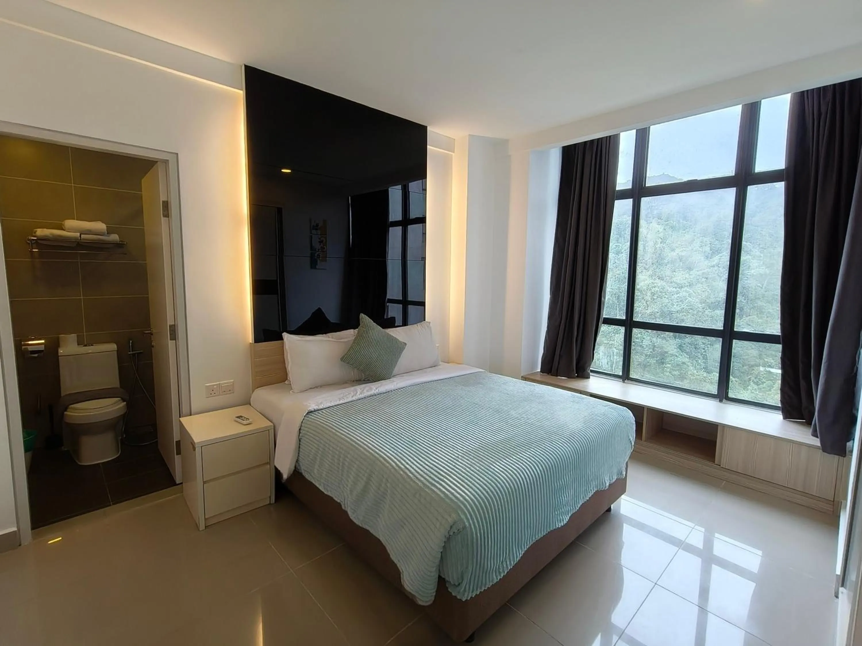 Bed in Emerald Homes Cozy Homestay at Ion Delemen Genting Highlands