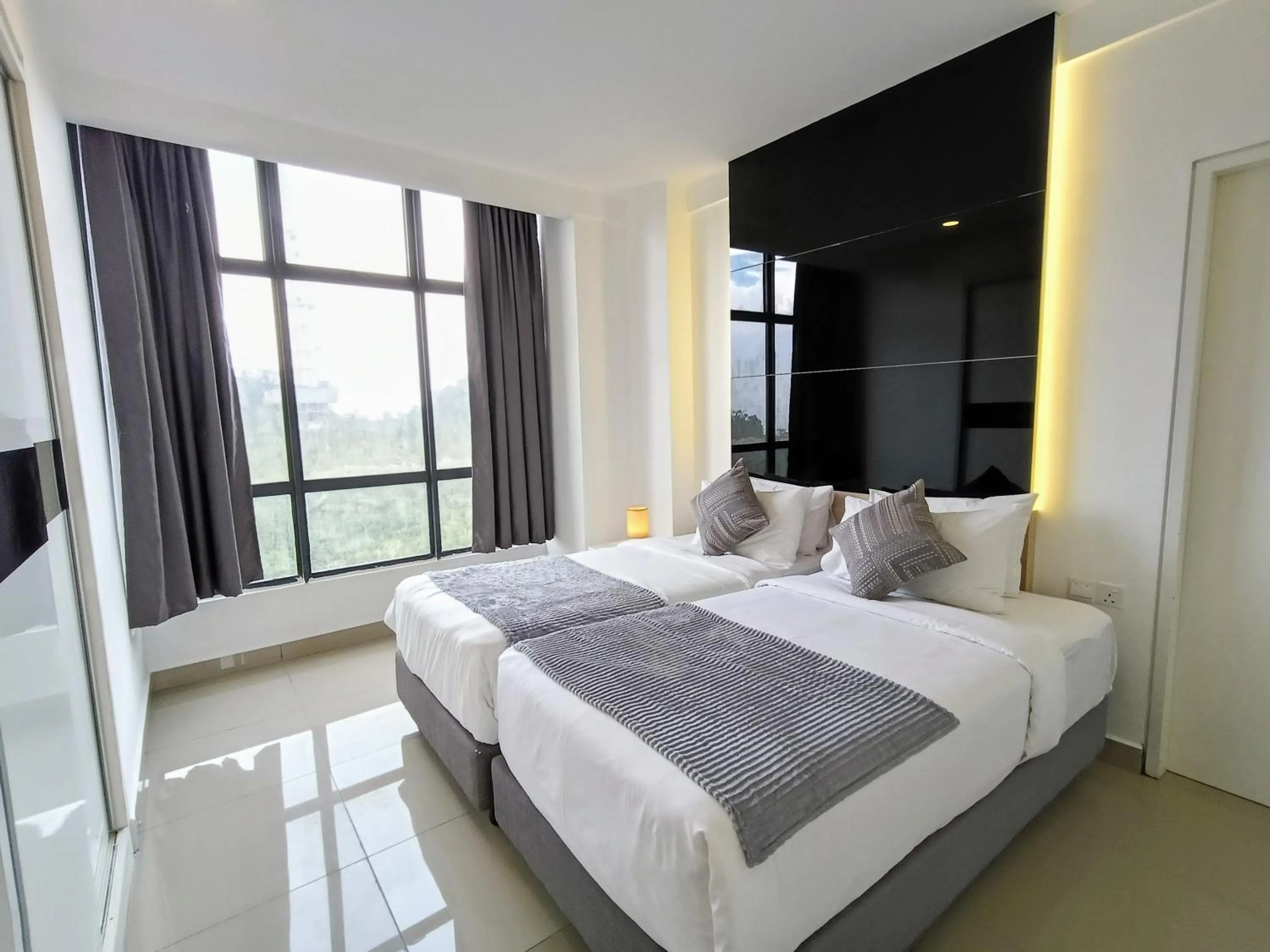 Bed in Emerald Homes Cozy Homestay at Ion Delemen Genting Highlands
