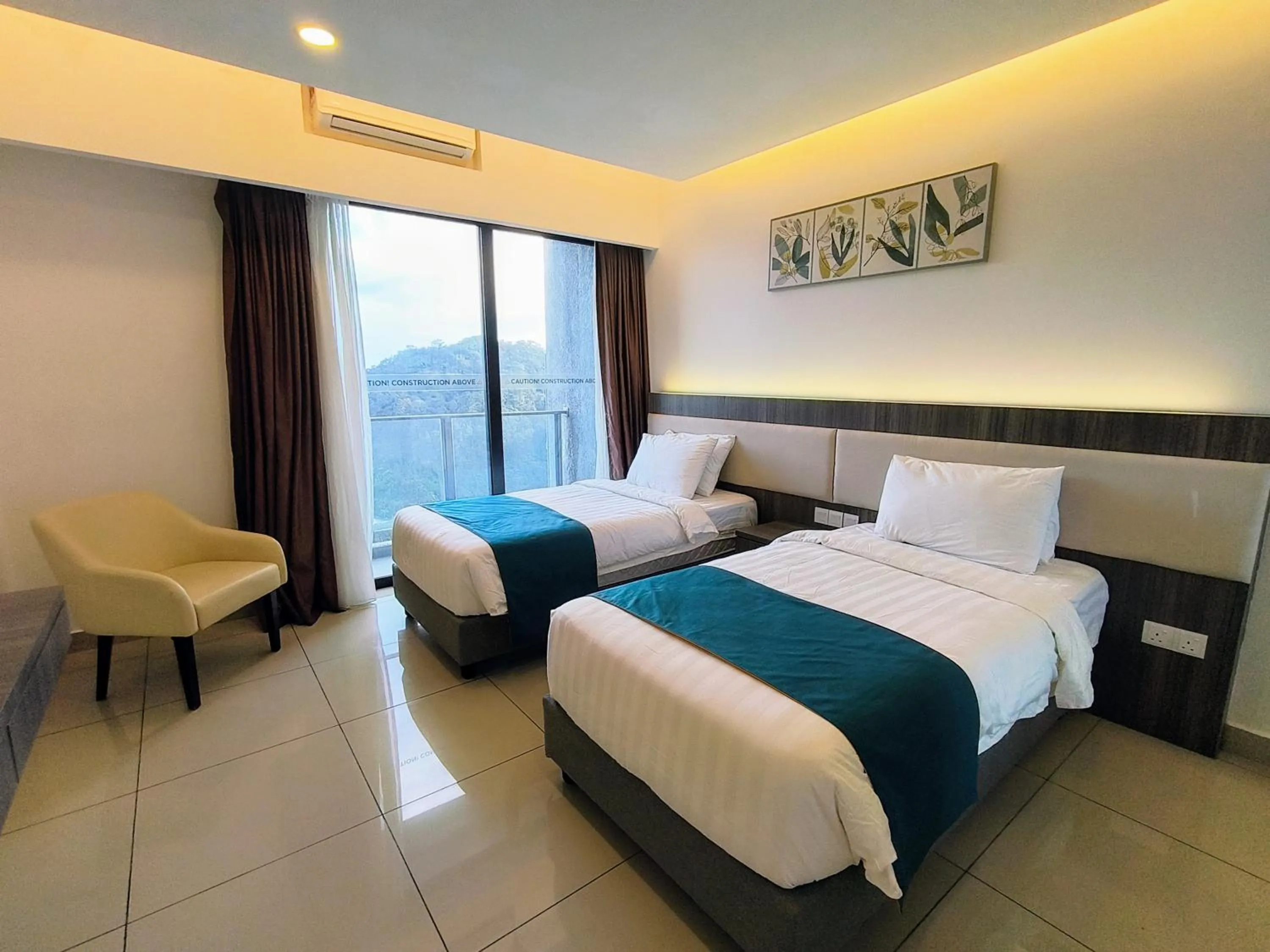 Photo of the whole room, Bed in Emerald Homes Cozy Homestay at Ion Delemen Genting Highlands