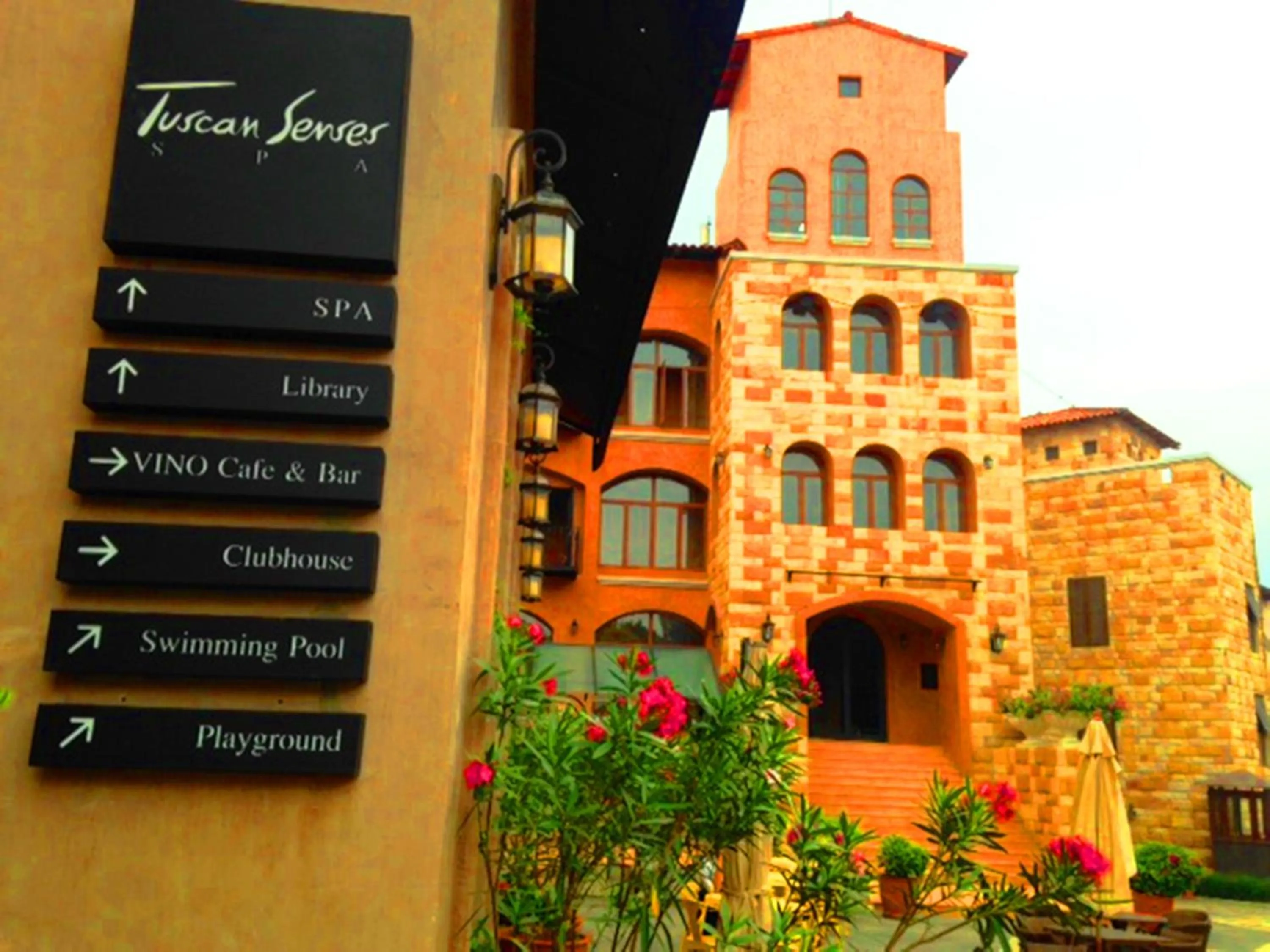 Logo/Certificate/Sign in Toscana Town Square Suites