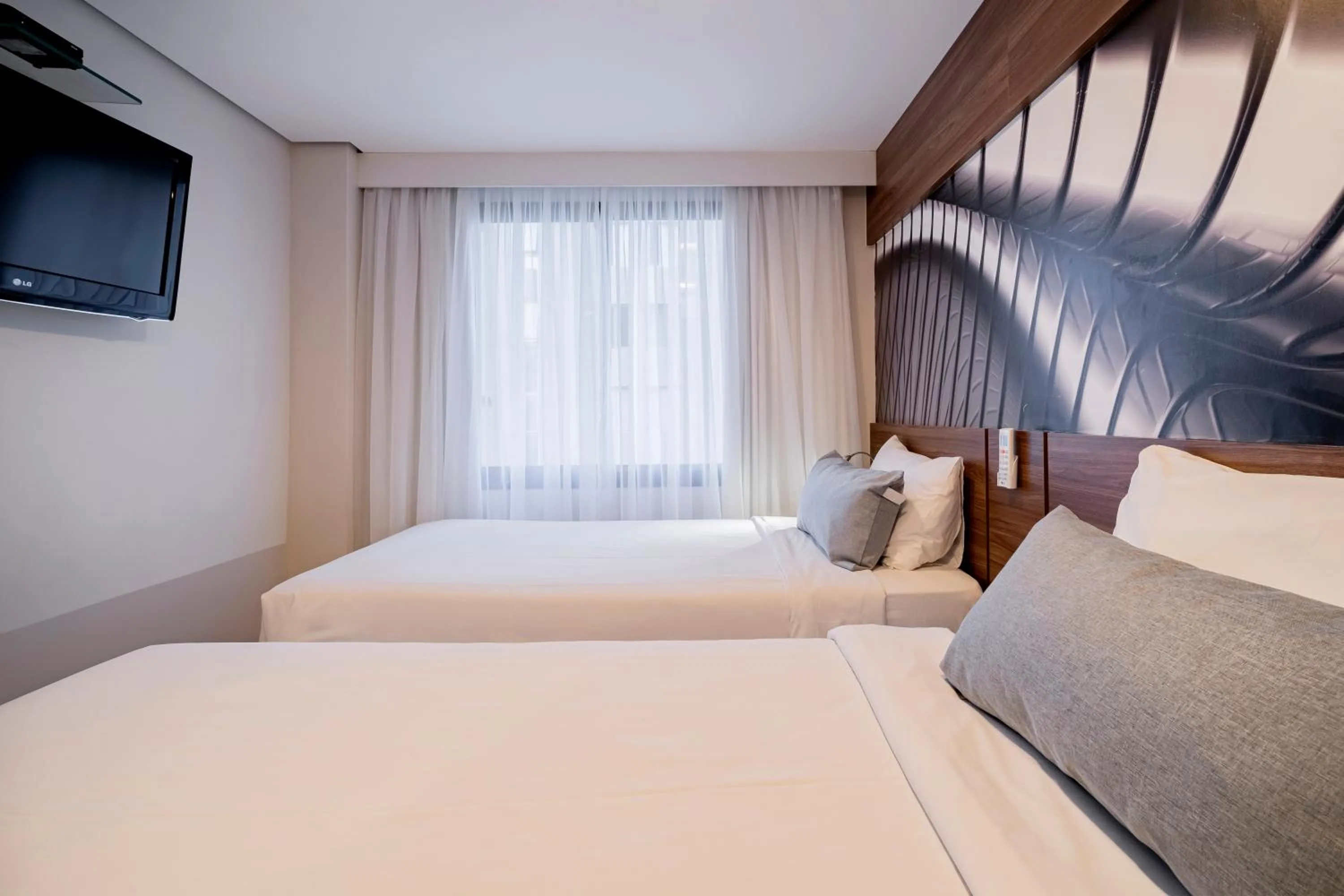 Bed in Mercure Sao Paulo Moema Times Square