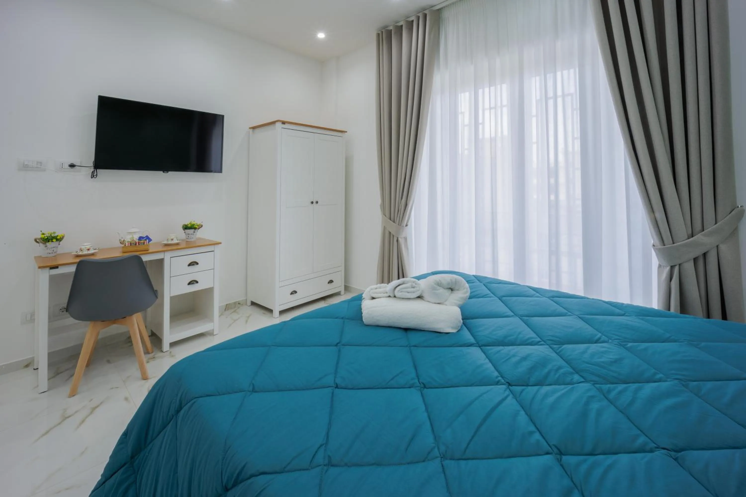 Bed in REDDIMUS Guest House