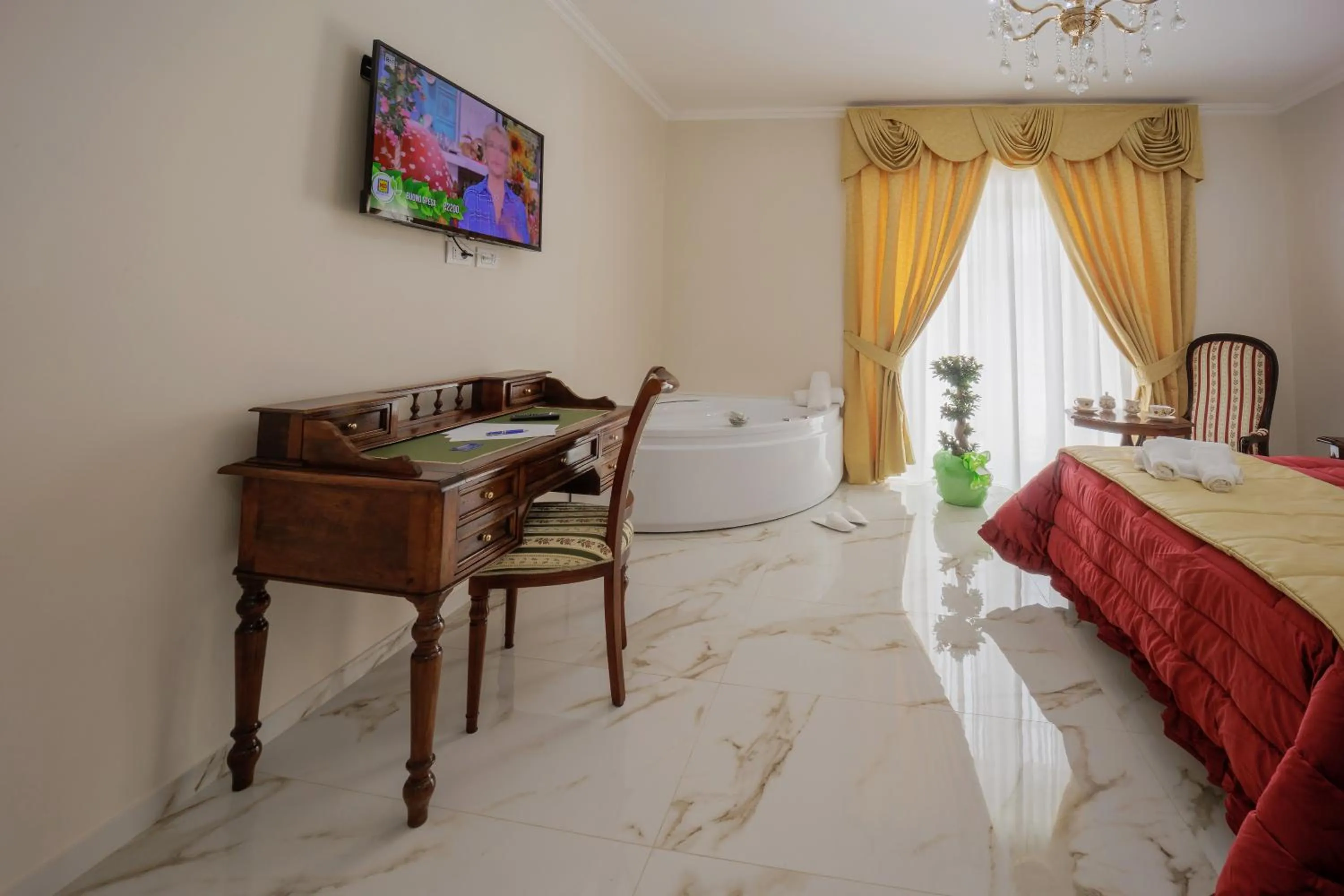 Seating area, Bed in REDDIMUS Guest House