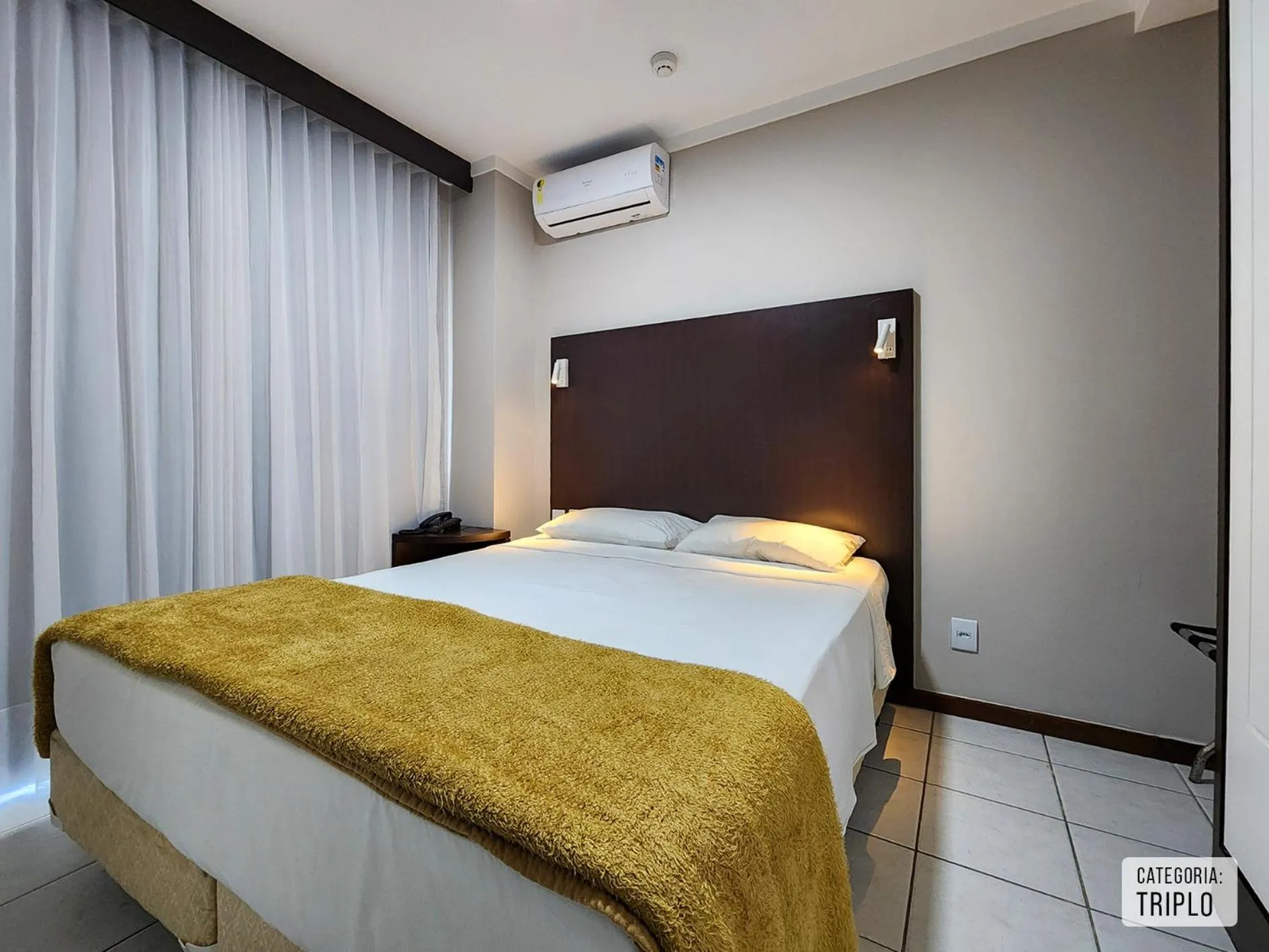 Bed in Triângulo Apart Hotel