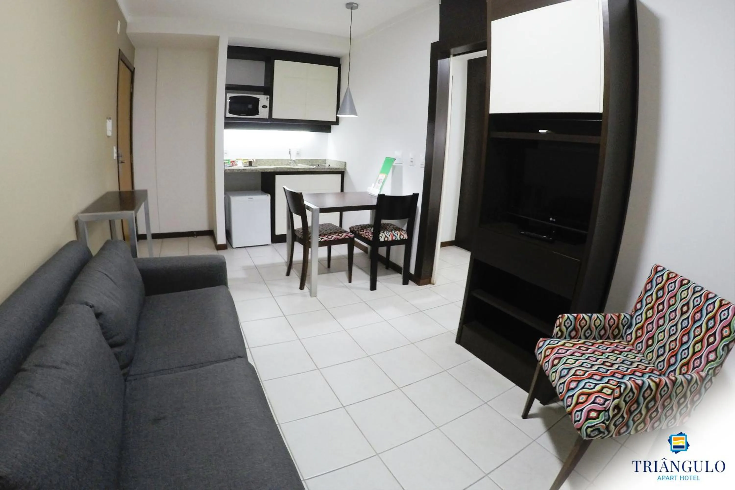 Living room in Triângulo Apart Hotel