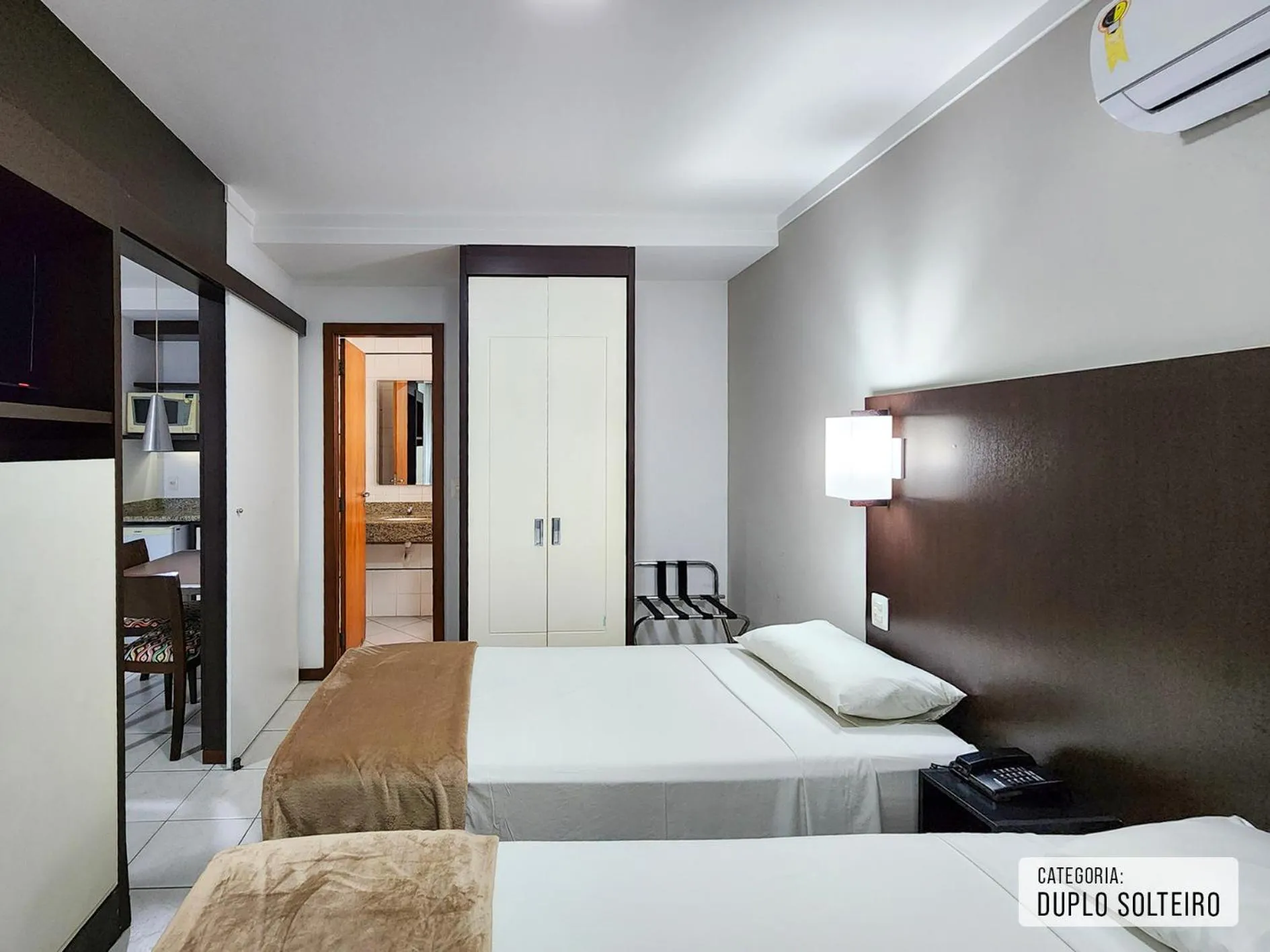 Bed in Triângulo Apart Hotel