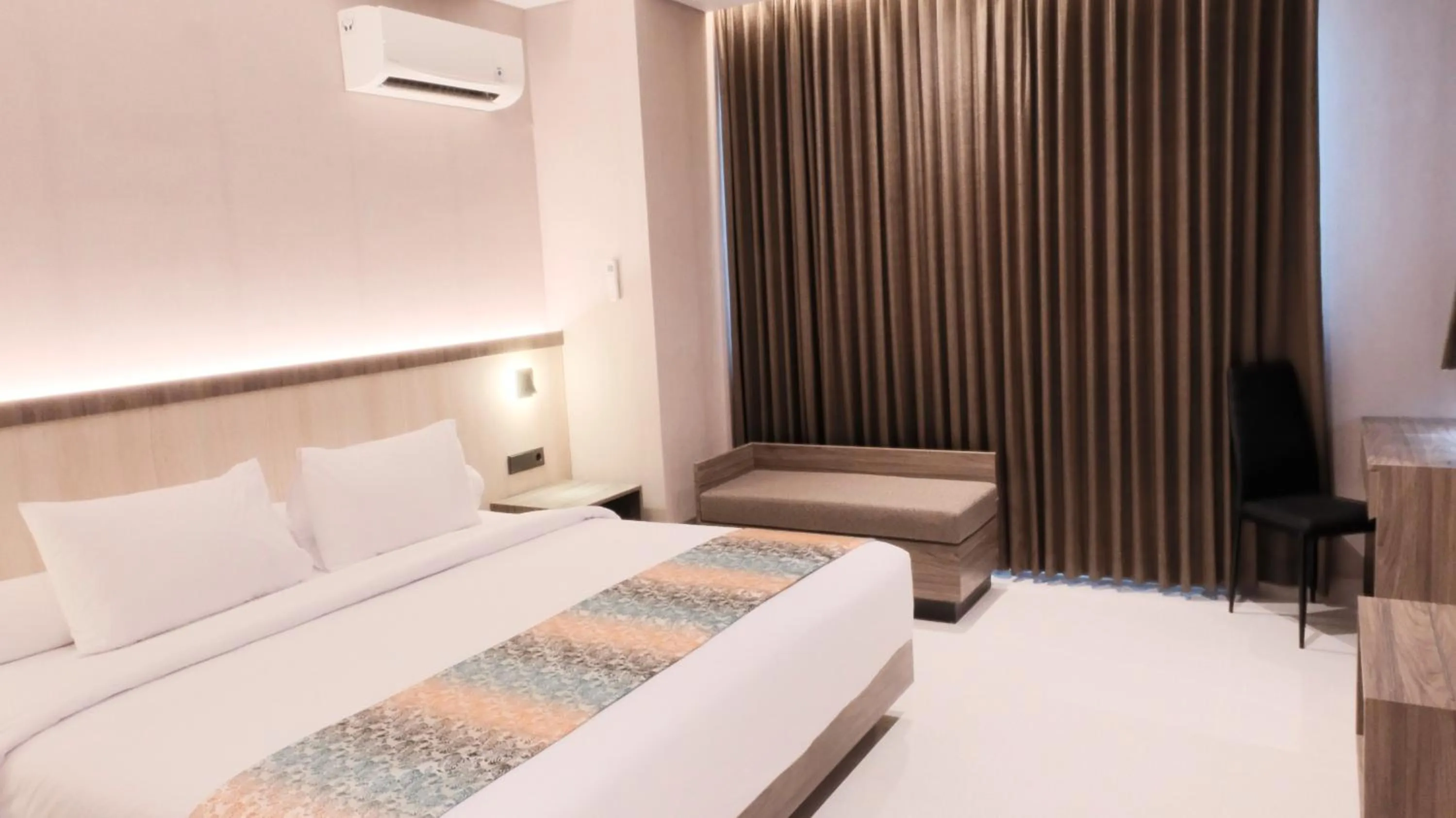 Bed in Eno Front One Hotel Semarang