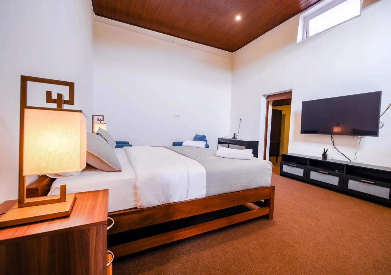 Bed in Lauriston Ooty Town Heritage Bungalow by VOYE HOMES