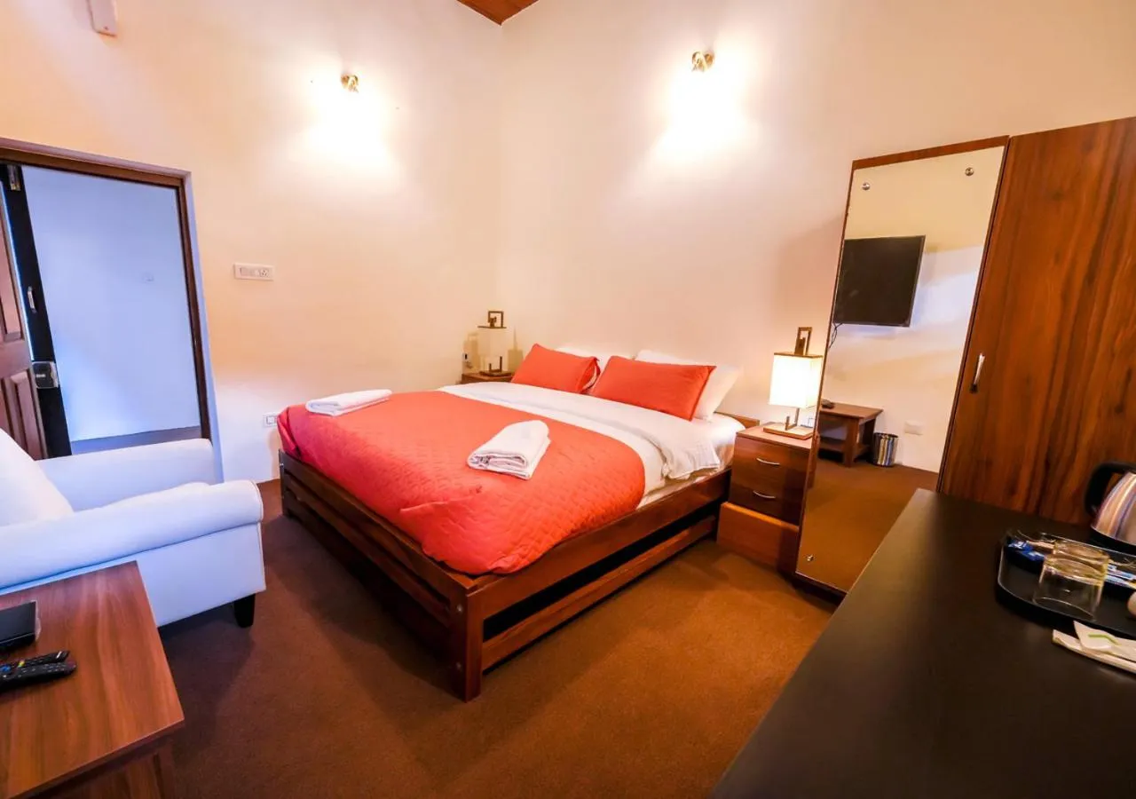 Bed in Lauriston Ooty Town Heritage Bungalow by VOYE HOMES