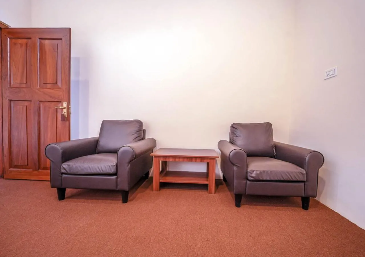 Bed in Lauriston Ooty Town Heritage Bungalow by VOYE HOMES