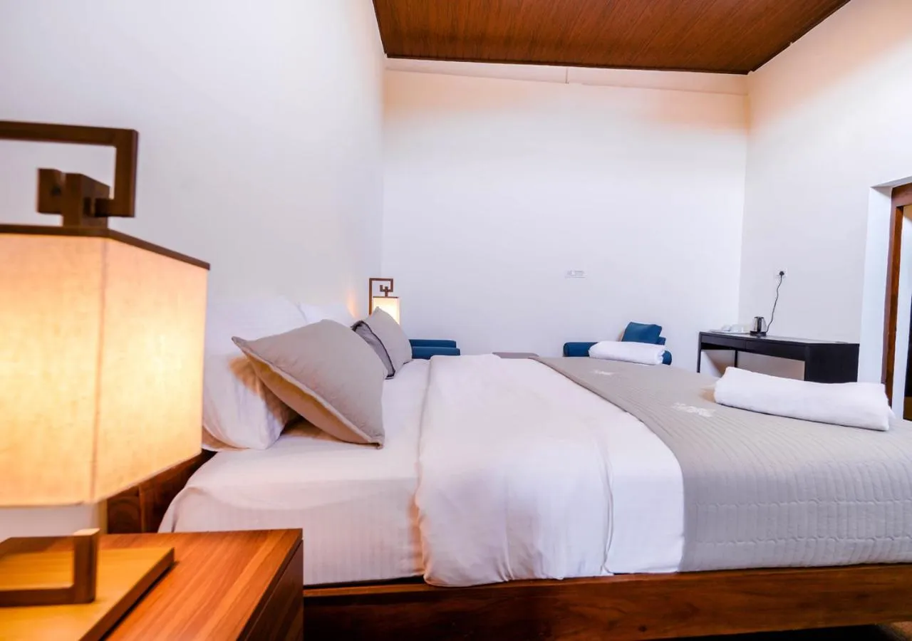 Bed in Lauriston Ooty Town Heritage Bungalow by VOYE HOMES