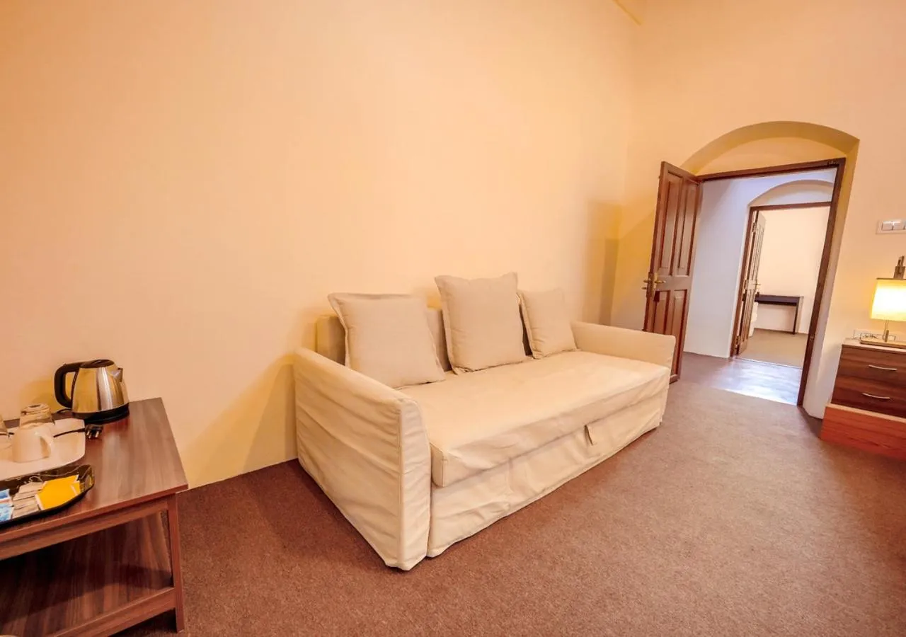 Bed in Lauriston Ooty Town Heritage Bungalow by VOYE HOMES