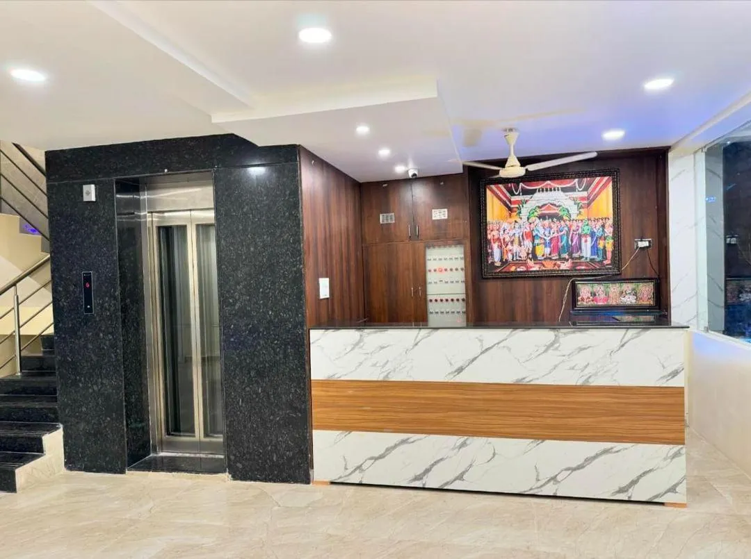 View (from property/room), Bed in HOTEL DKR GRAND