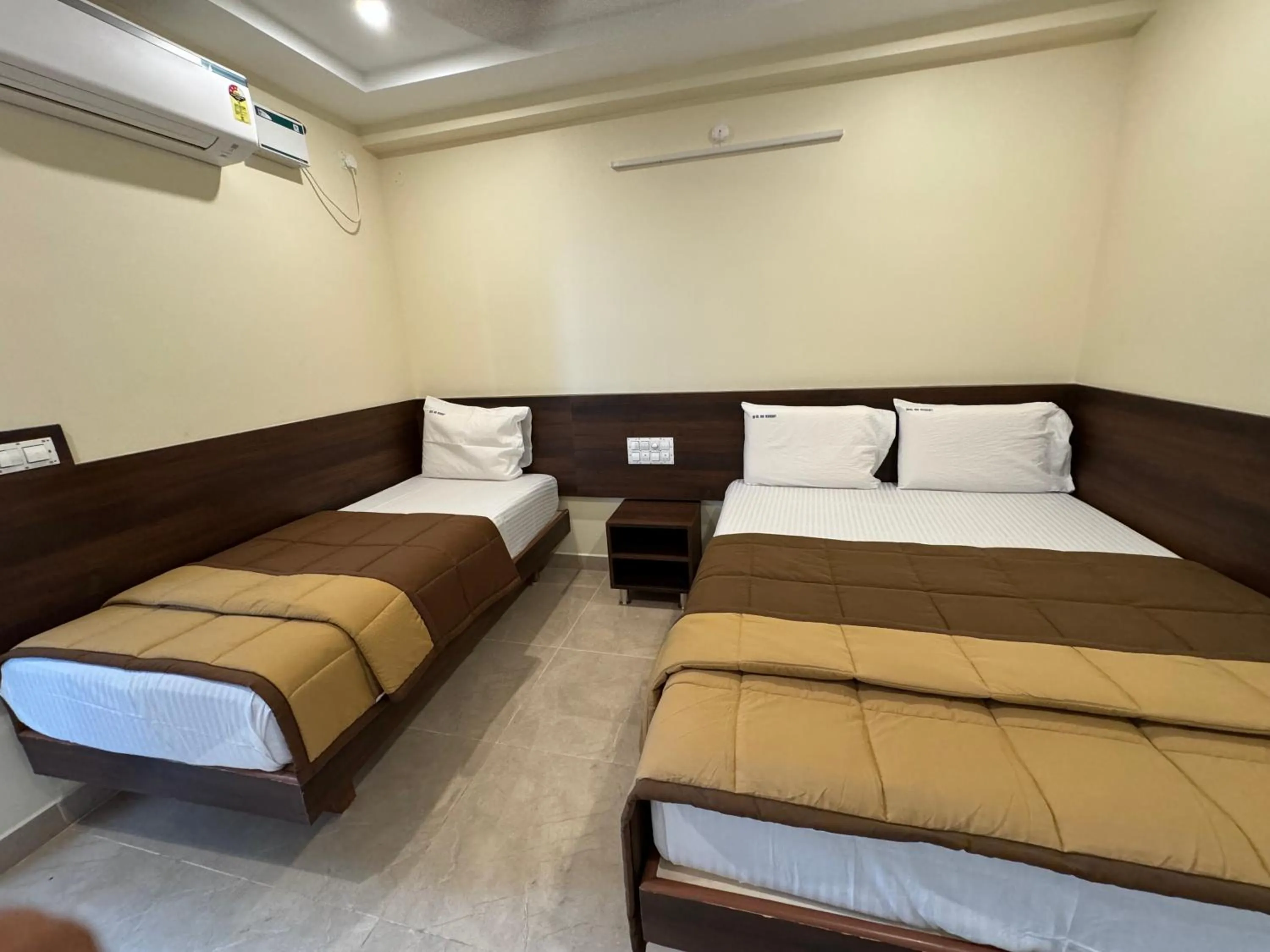 Photo of the whole room, Bed in HOTEL DKR GRAND