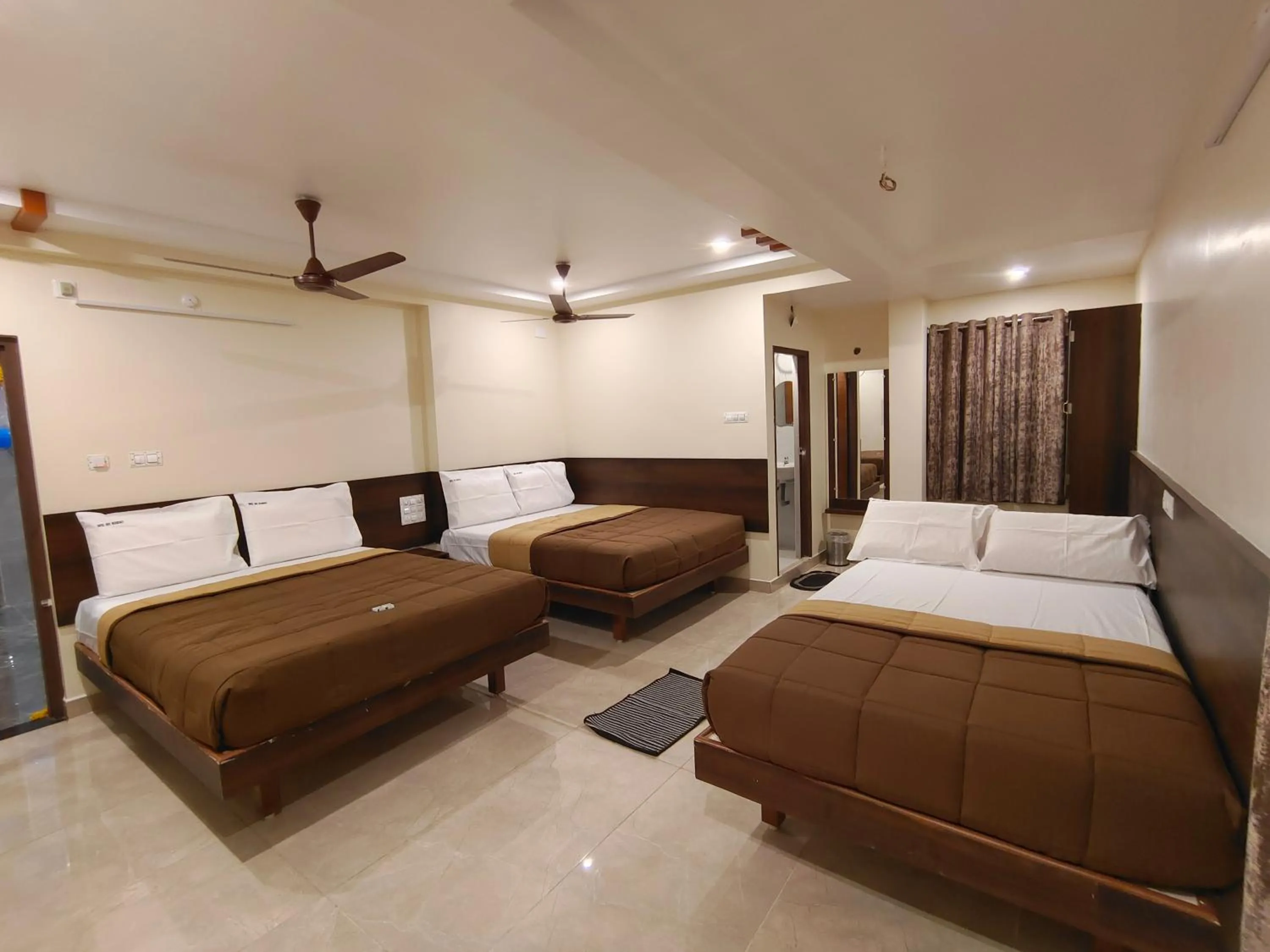 Bed in HOTEL DKR GRAND