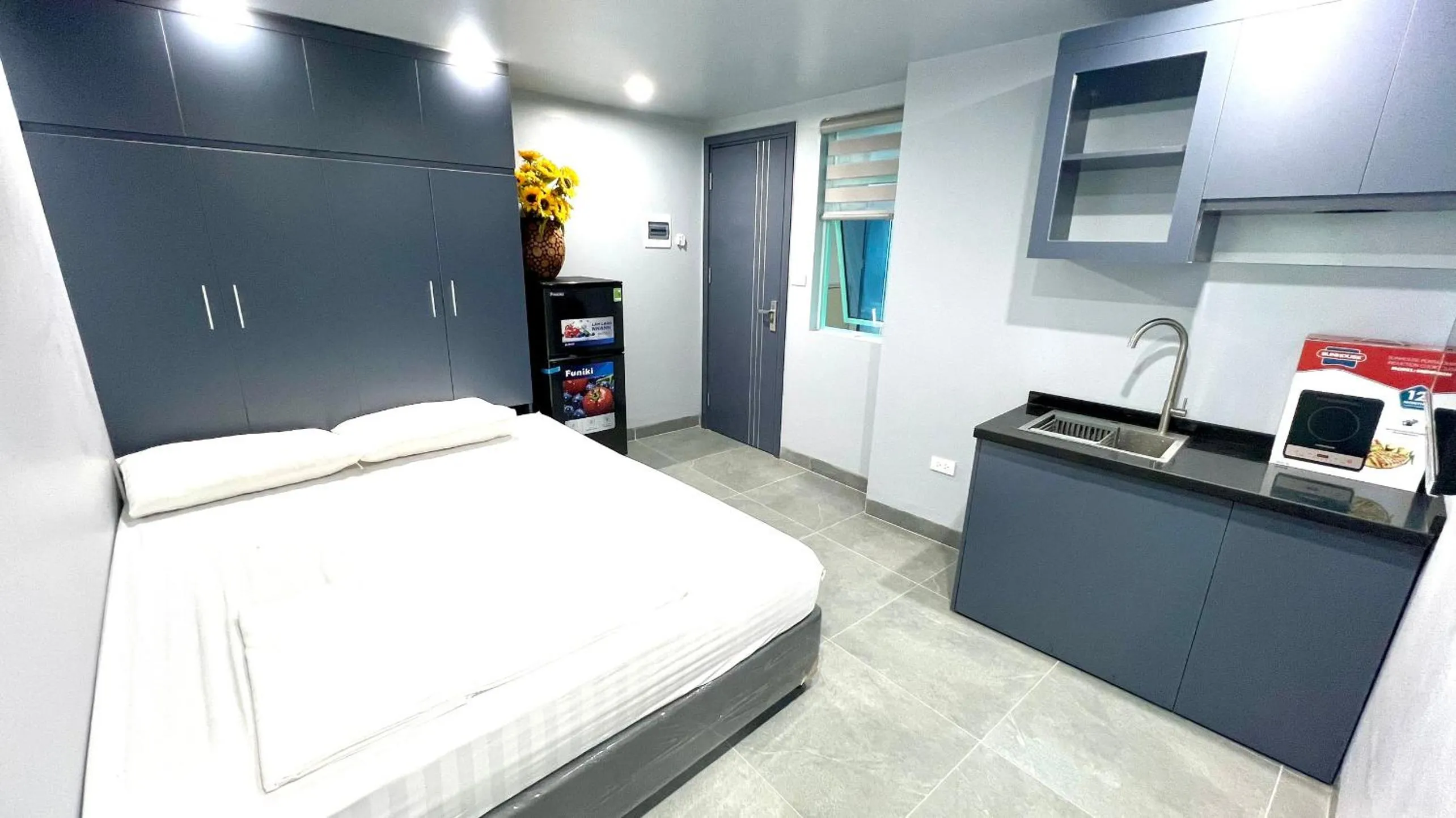 Kitchen or kitchenette, Bed in Era Apartment Cat Linh