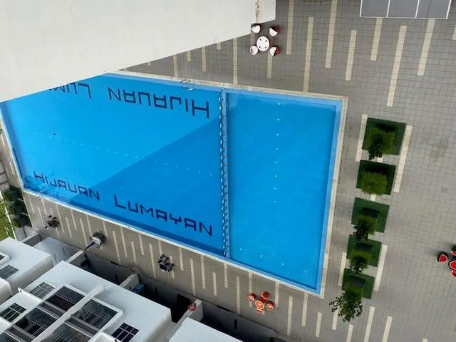 Swimming pool in The Comfy Stay