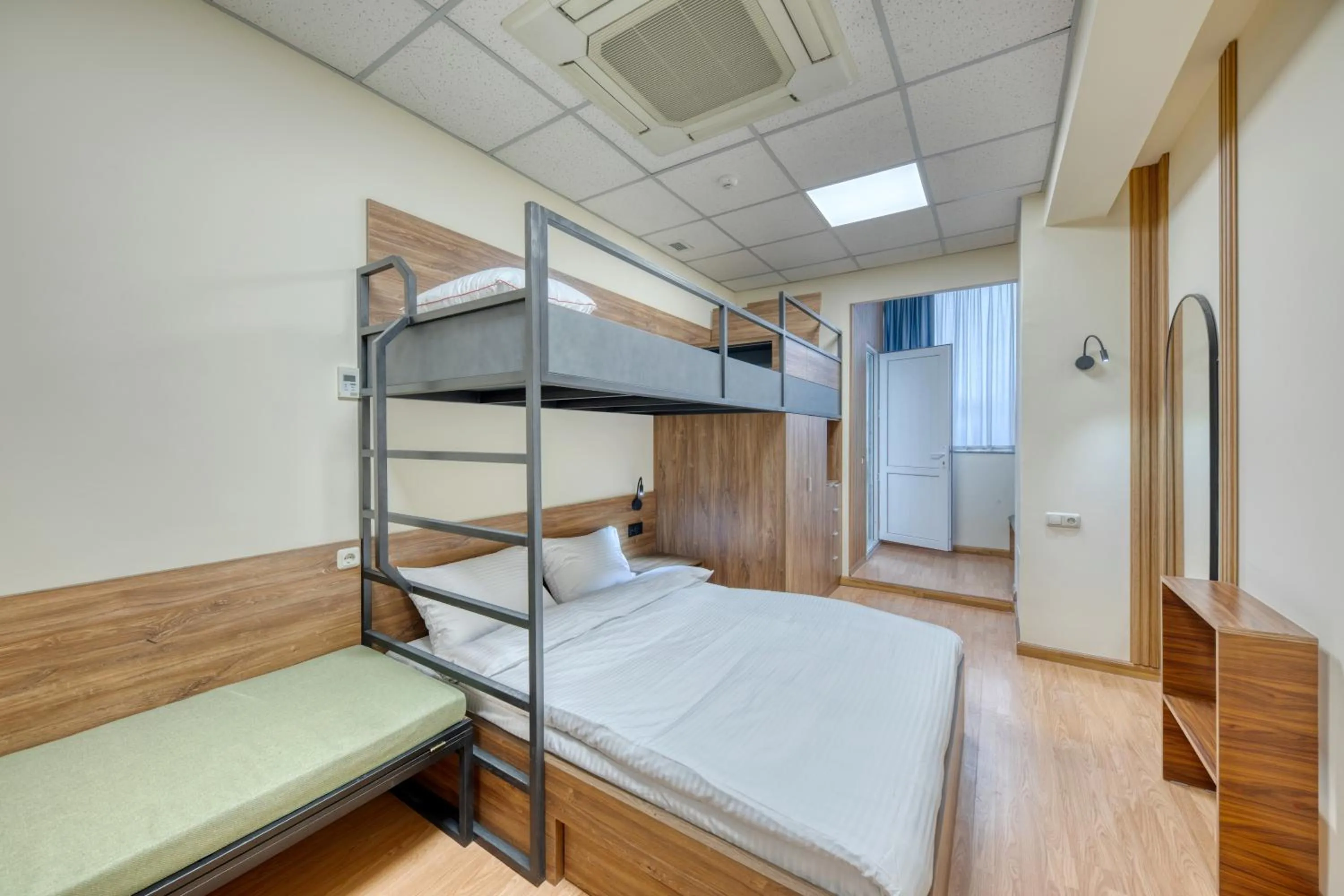 Bed in Tropica Inn Hotel