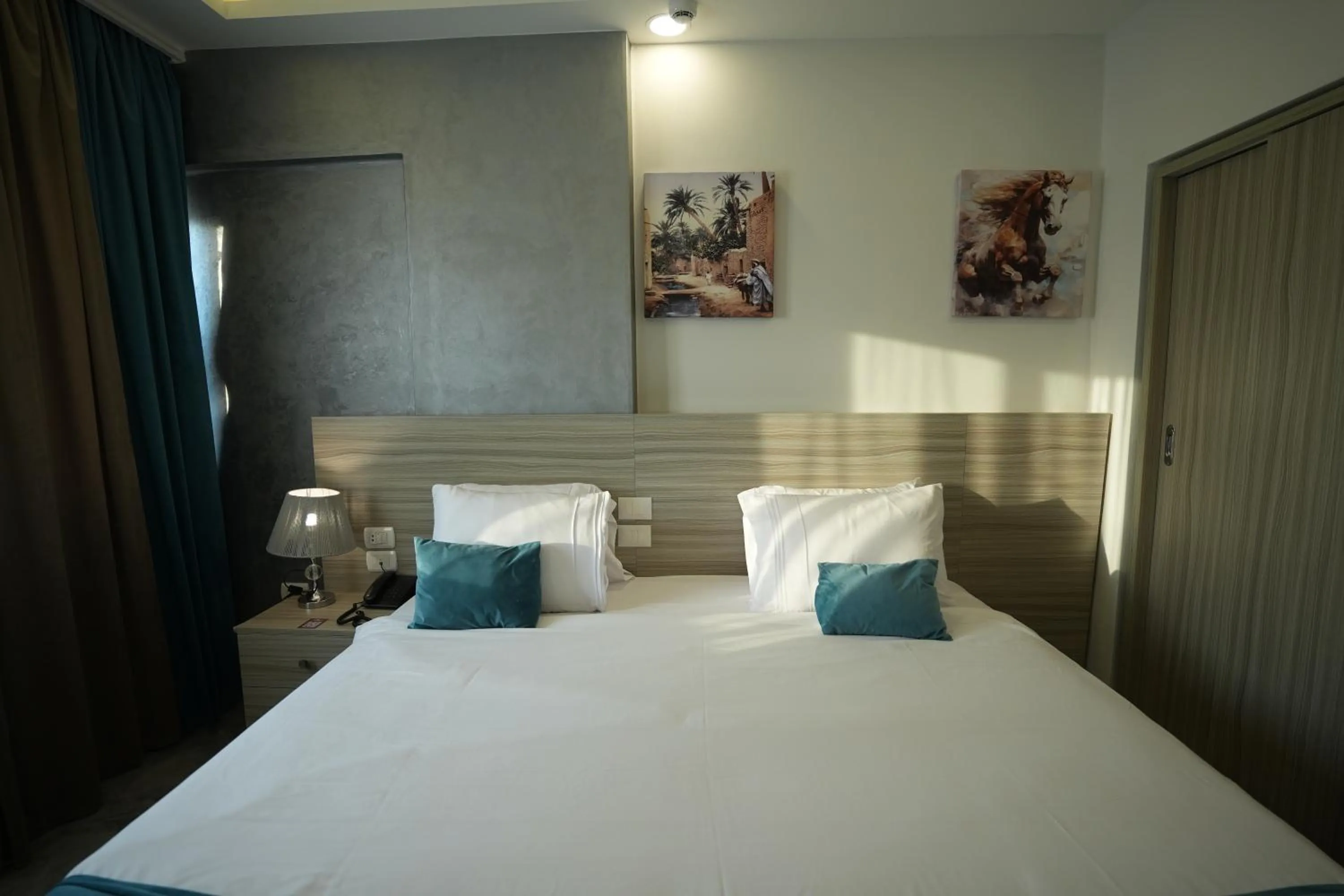 Bed in Mar Charbel Hotel Cairo