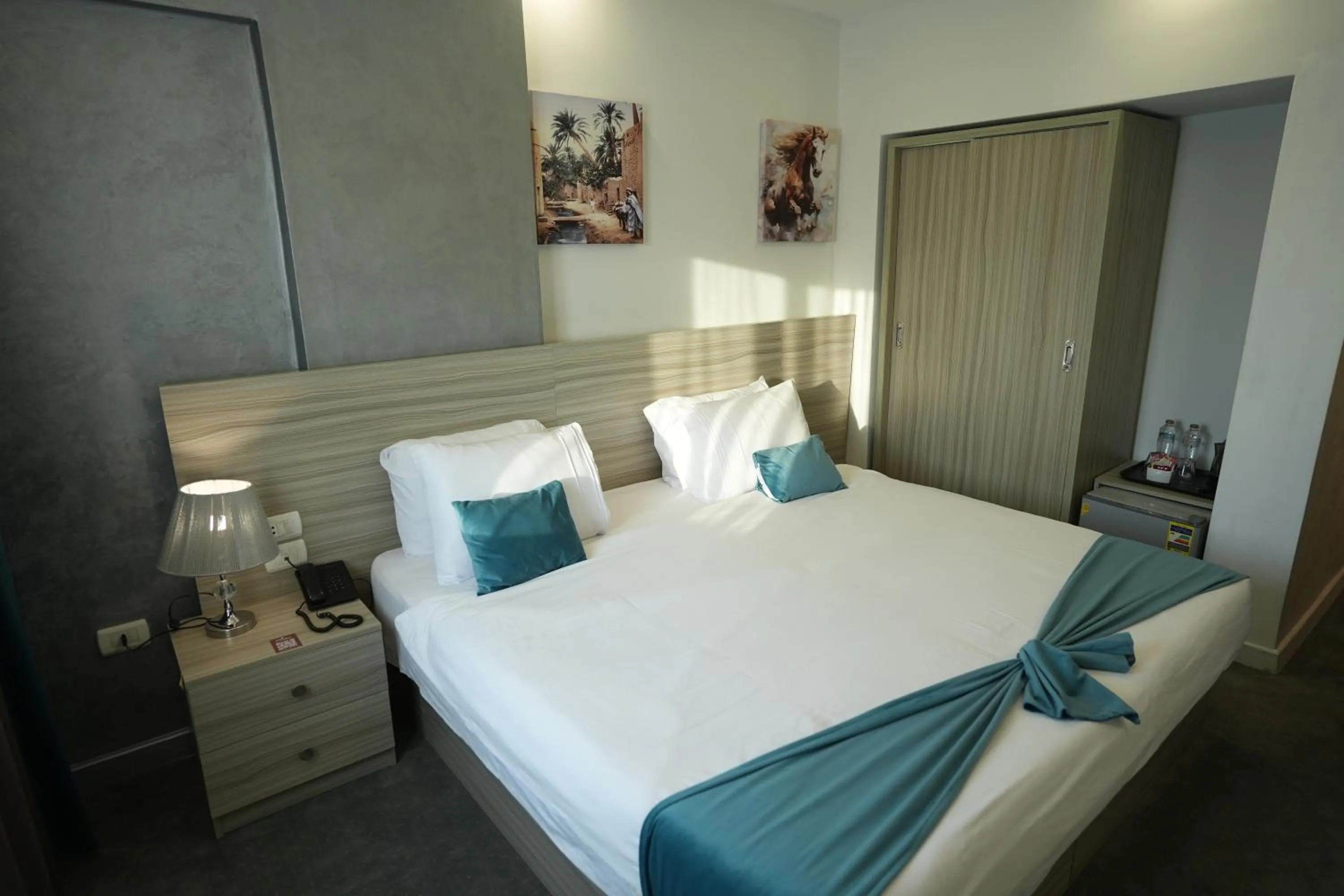 Bed in Mar Charbel Hotel Cairo