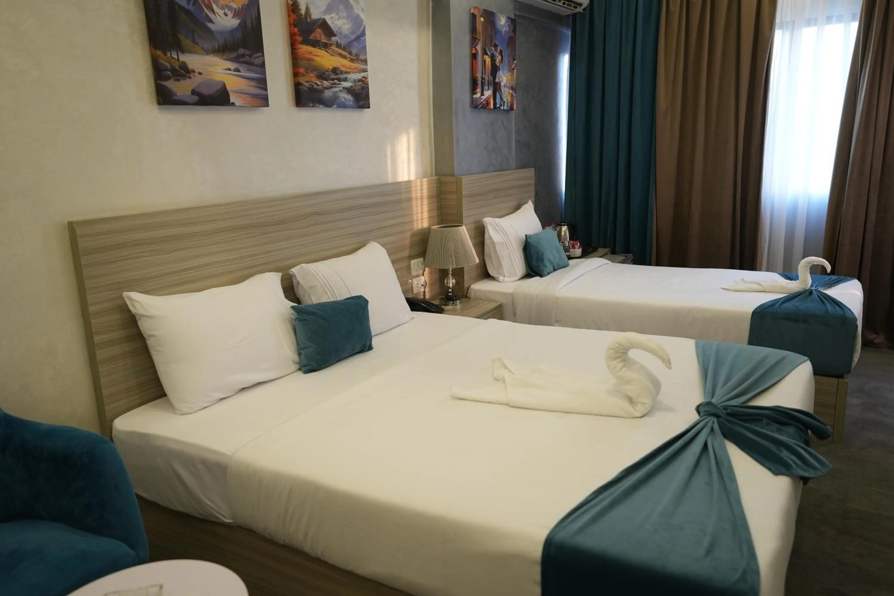 Bed in Mar Charbel Hotel Cairo