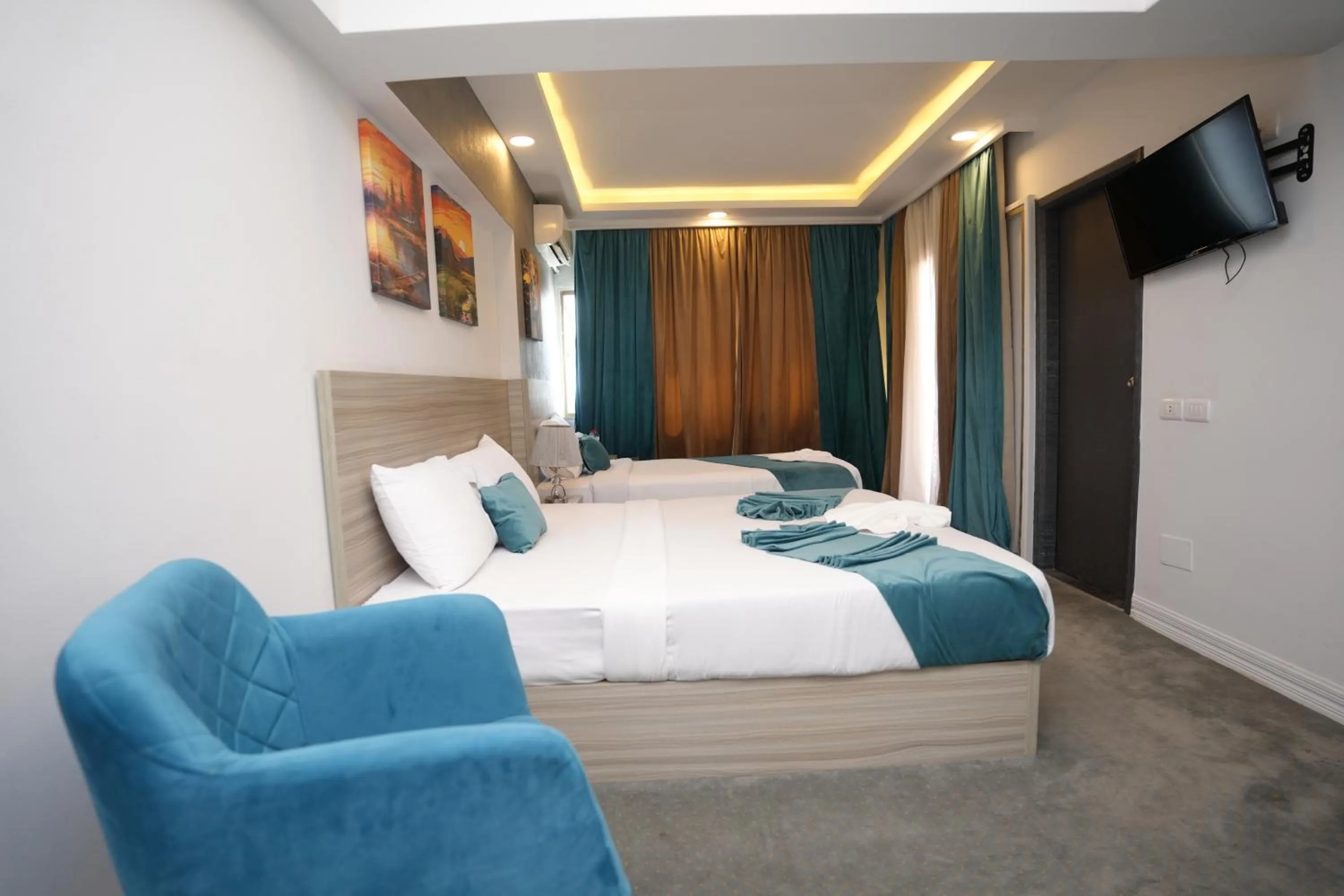 Bed in Mar Charbel Hotel Cairo