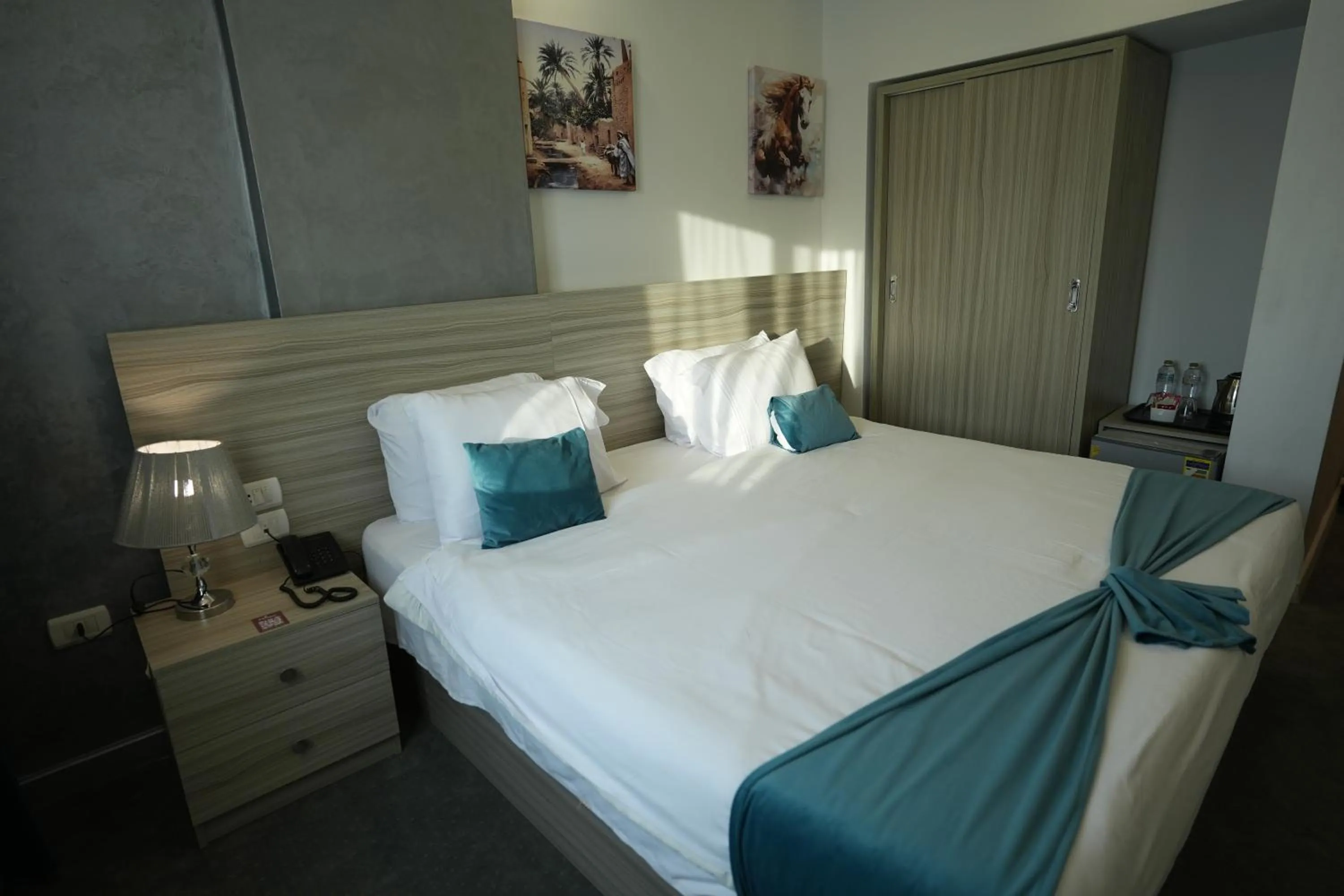 Bed in Mar Charbel Hotel Cairo