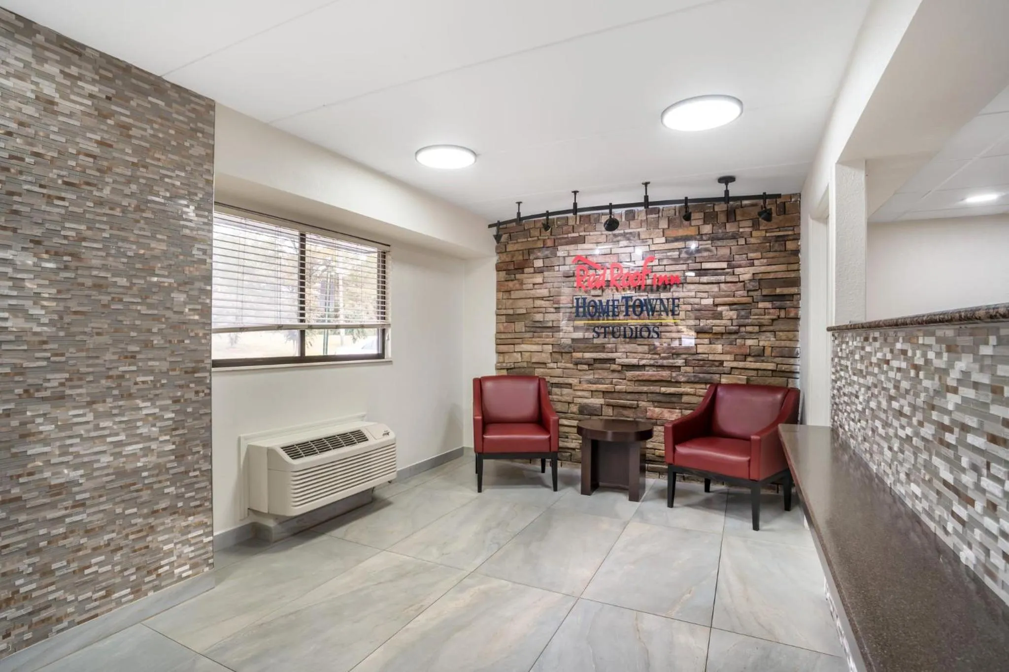 Lobby or reception in HomeTowne Studios by Red Roof Greenville