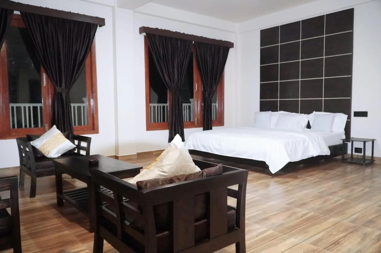 Bed in ROYALTY GLOBAL HOMESTAY