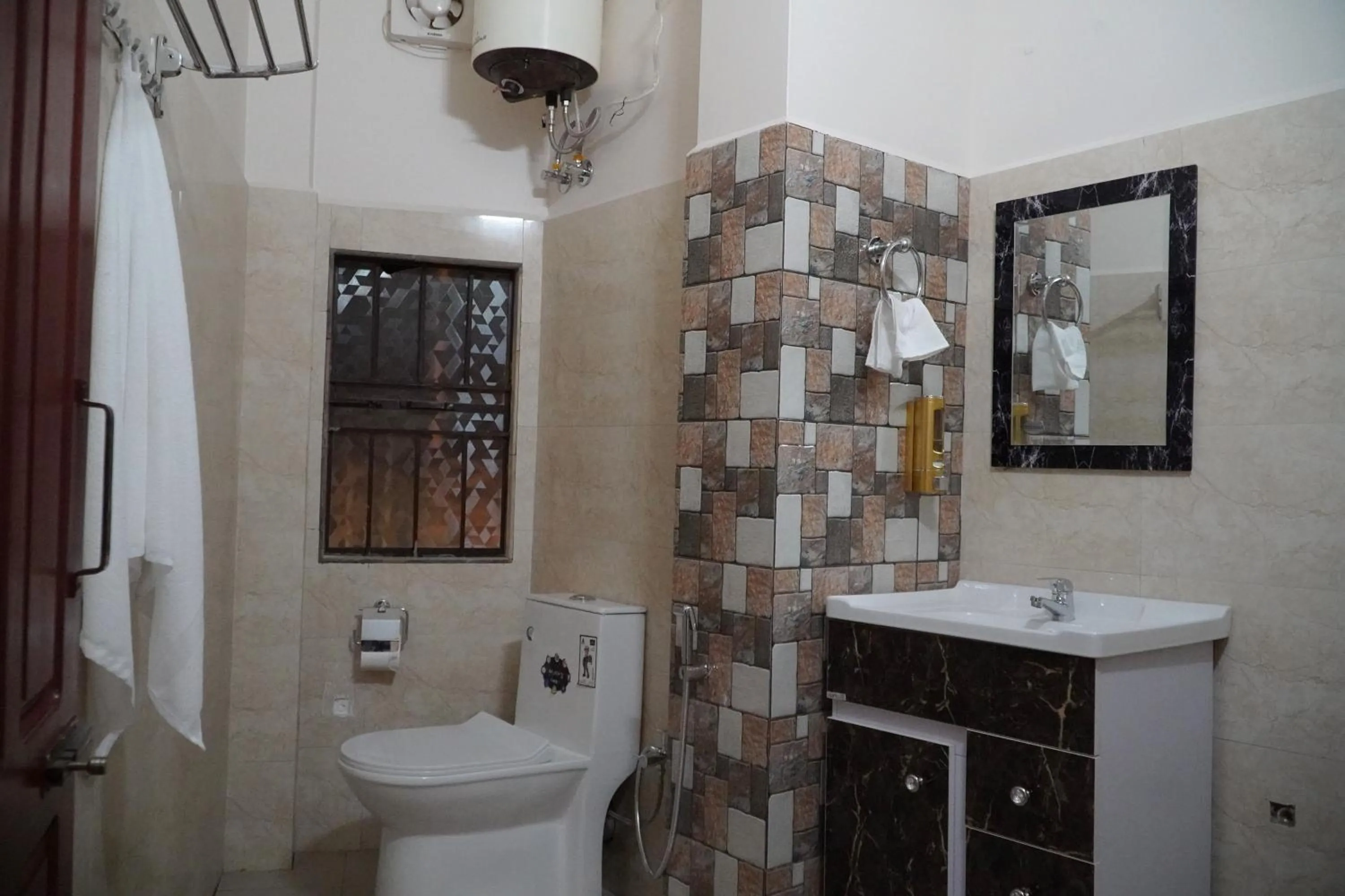 Bathroom in ROYALTY GLOBAL HOMESTAY