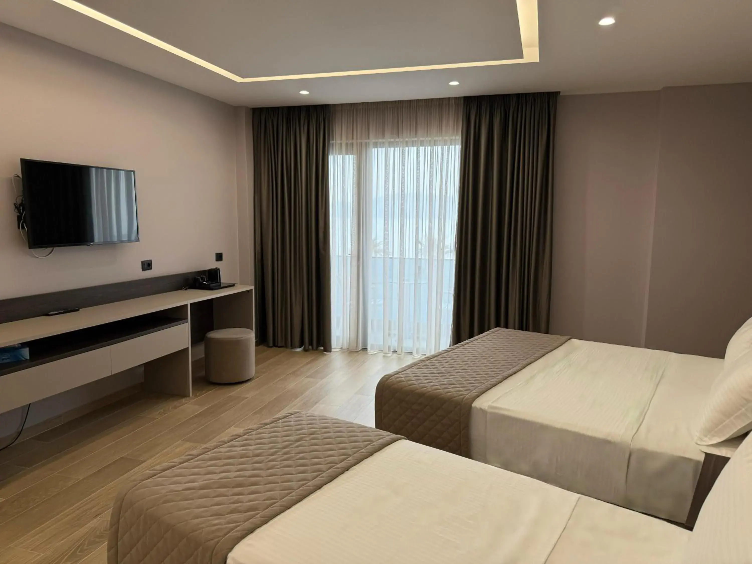 Deluxe Triple Room with Sea View in Joelle Premium Hotel Deluxe Triple Room with Sea View in Joelle Premium Hotel