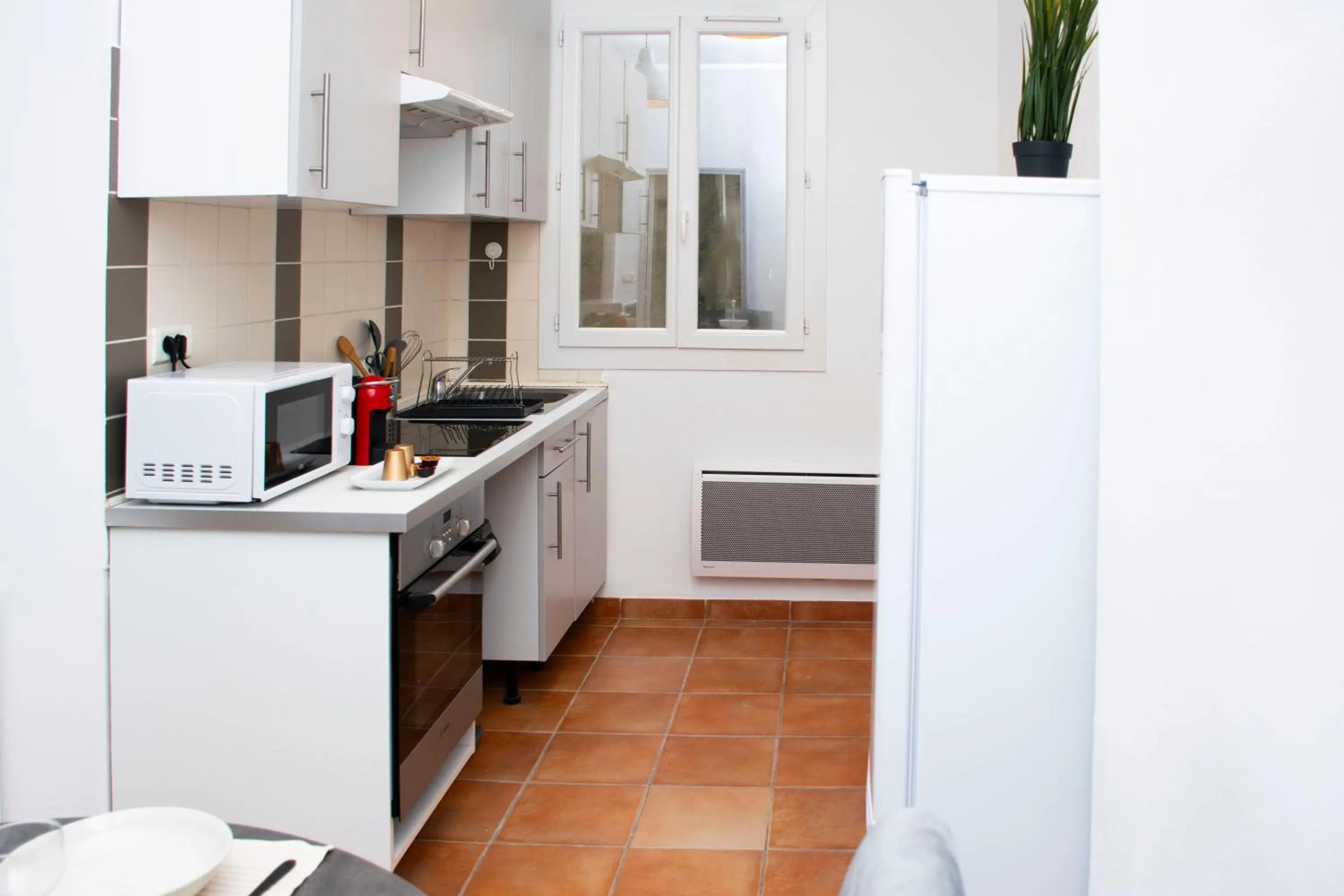 Kitchen or kitchenette in Appartement au coeur du Vieux-Port