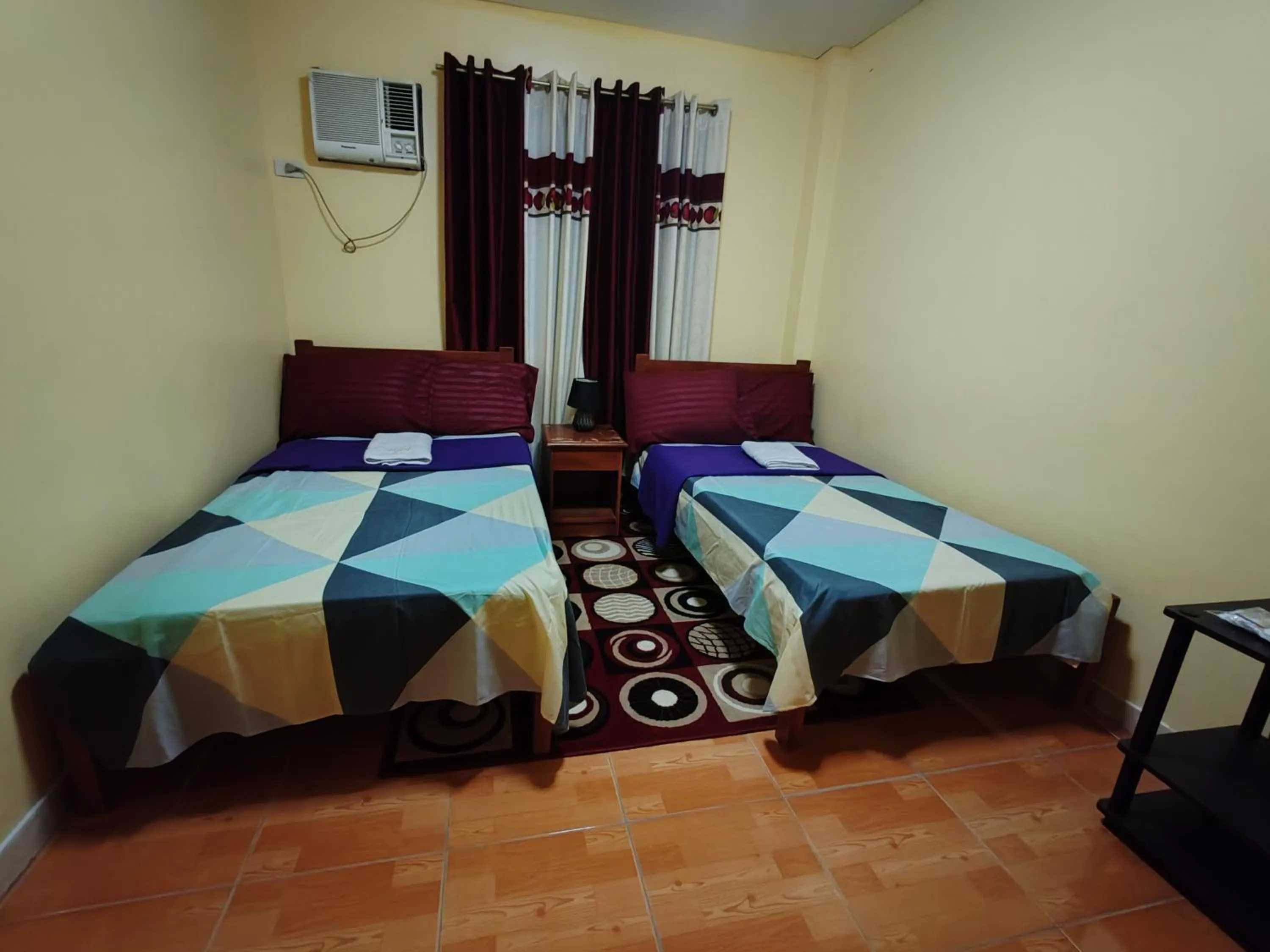 Bed in TGH Guest House Badian