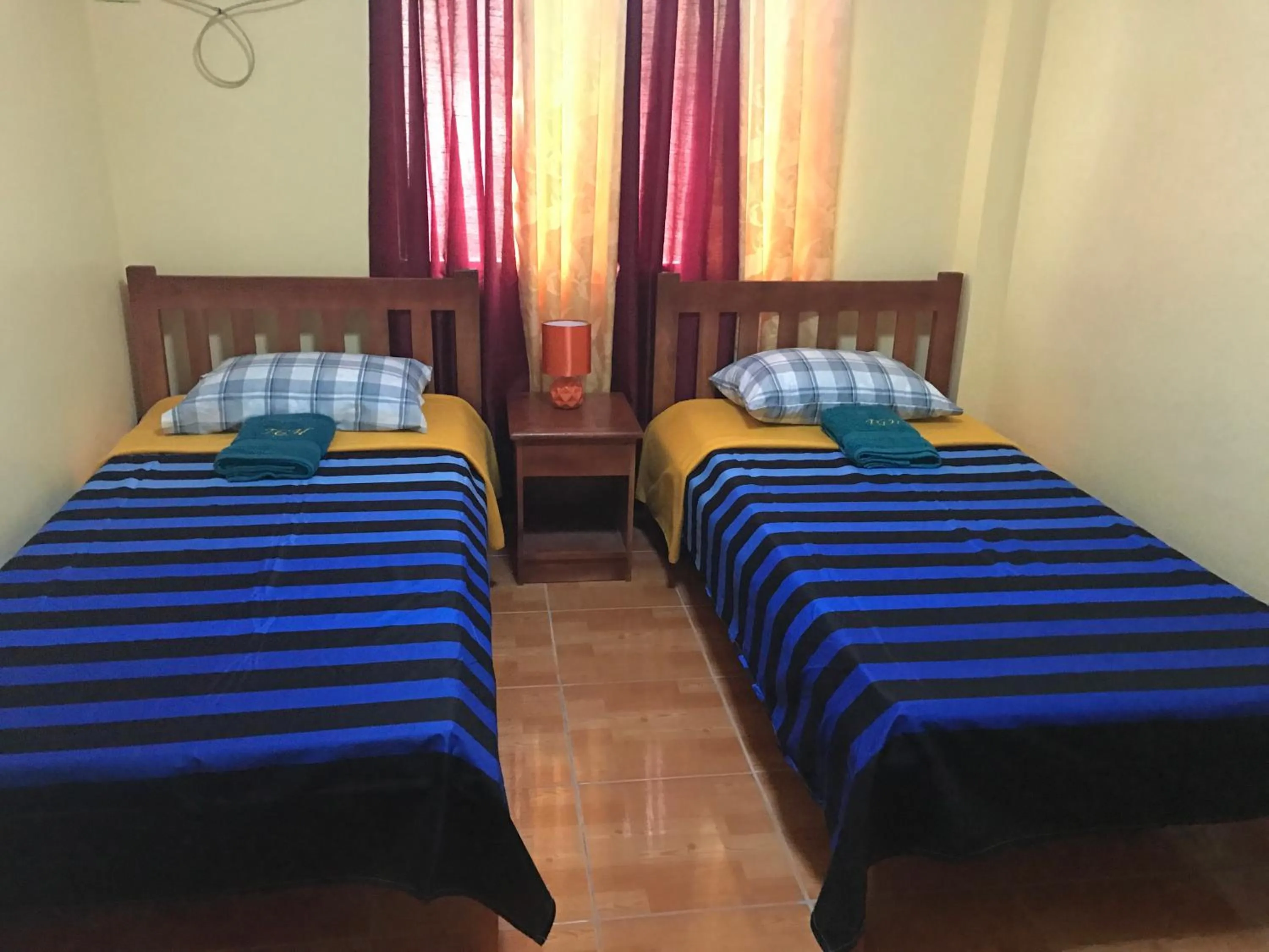 Bed in TGH Guest House Badian