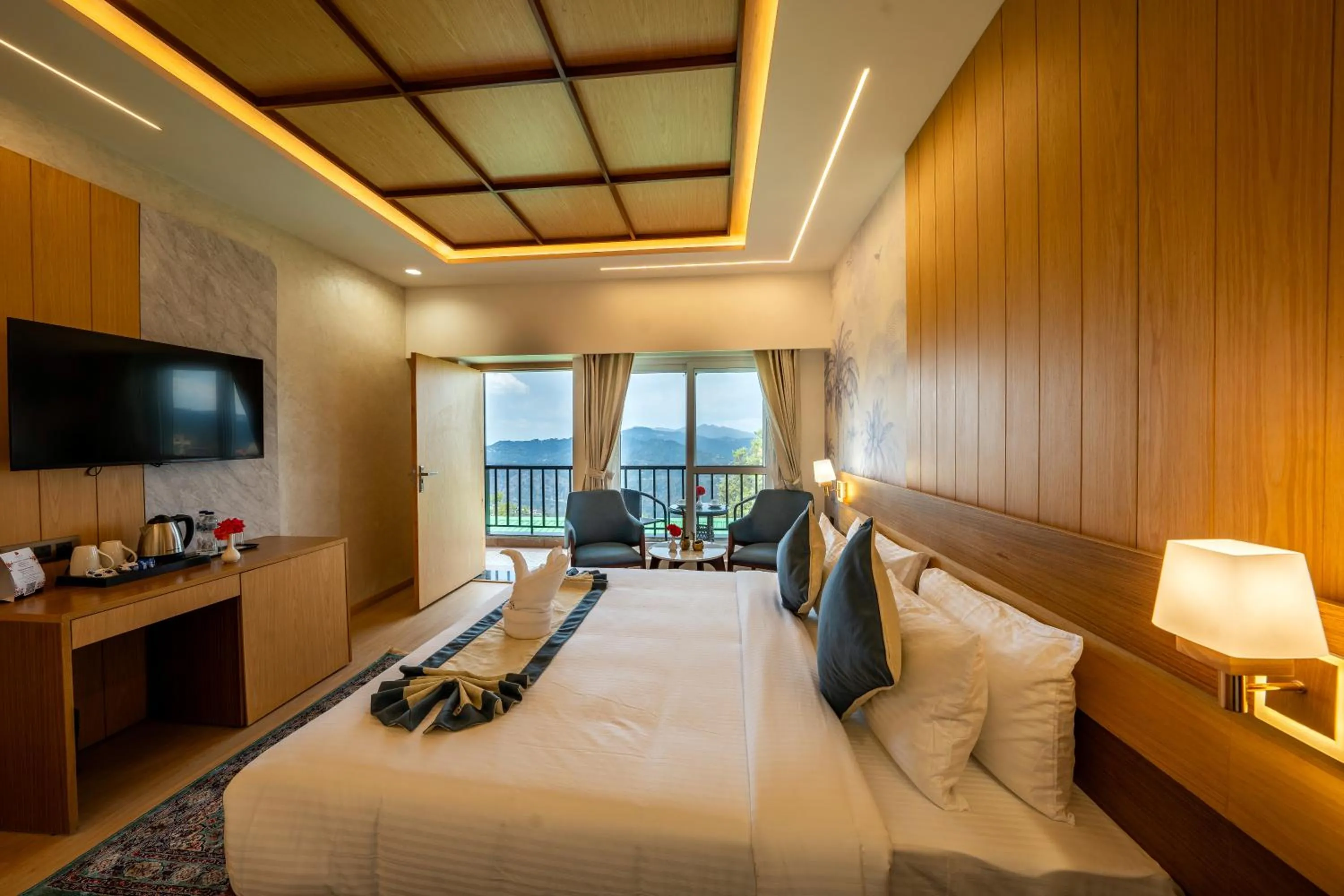 Bed in Arkaya Mukteshwar by SuperGlitz Resorts Pvt Ltd