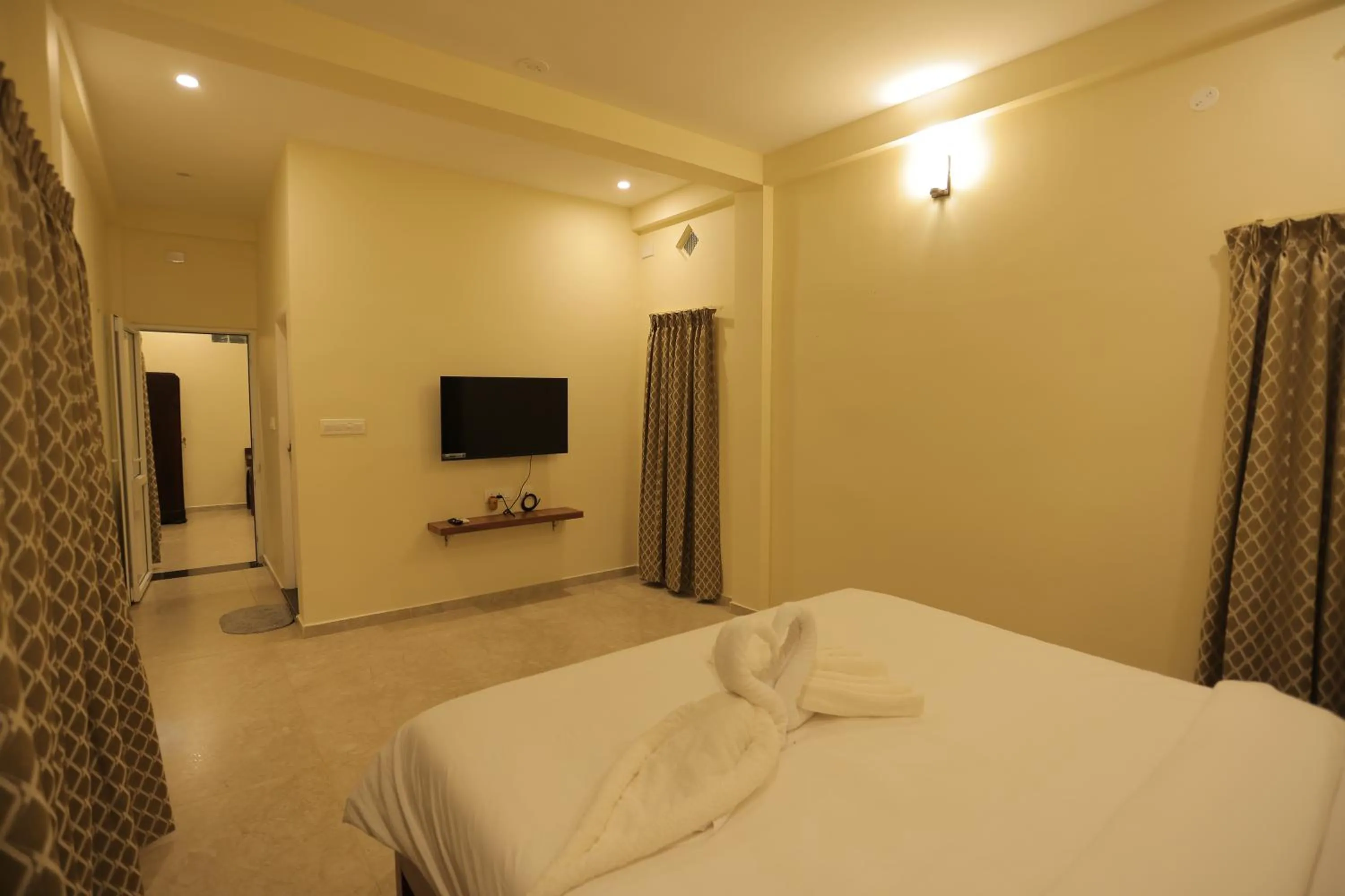 Bed in PALM PARADISE Beach Resort