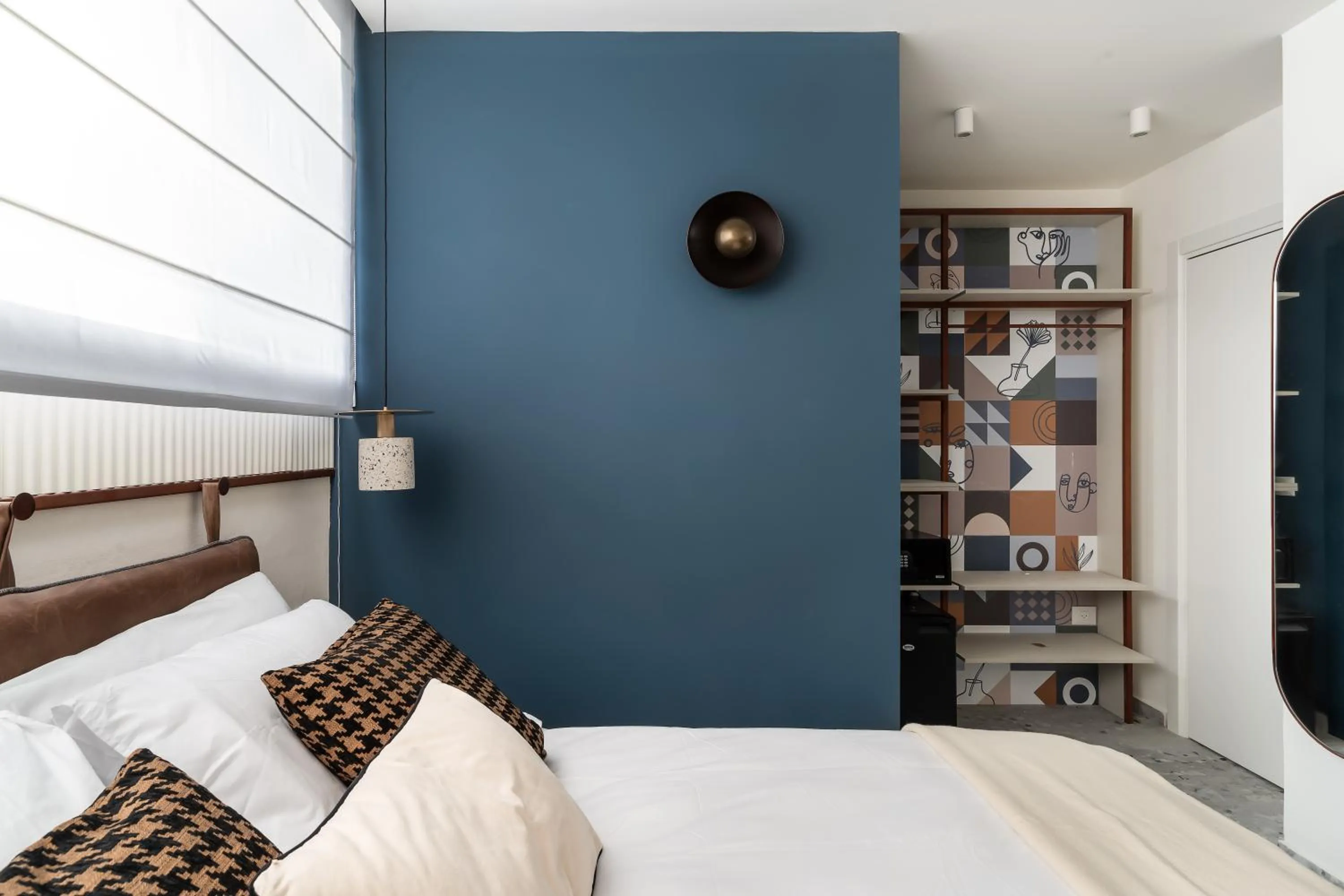 Bed in Mulan Hotel TLV