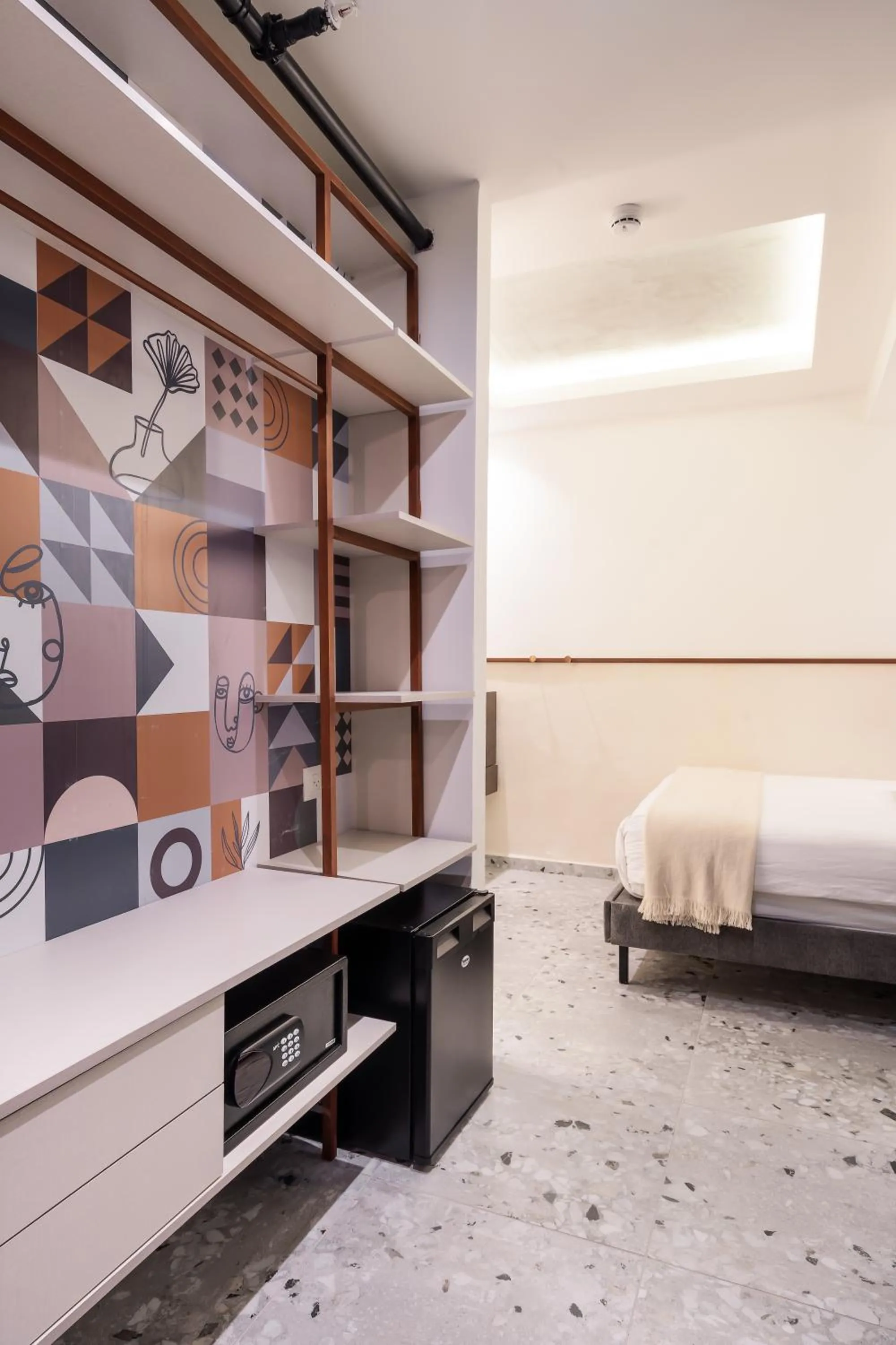 Bed in Mulan Hotel TLV
