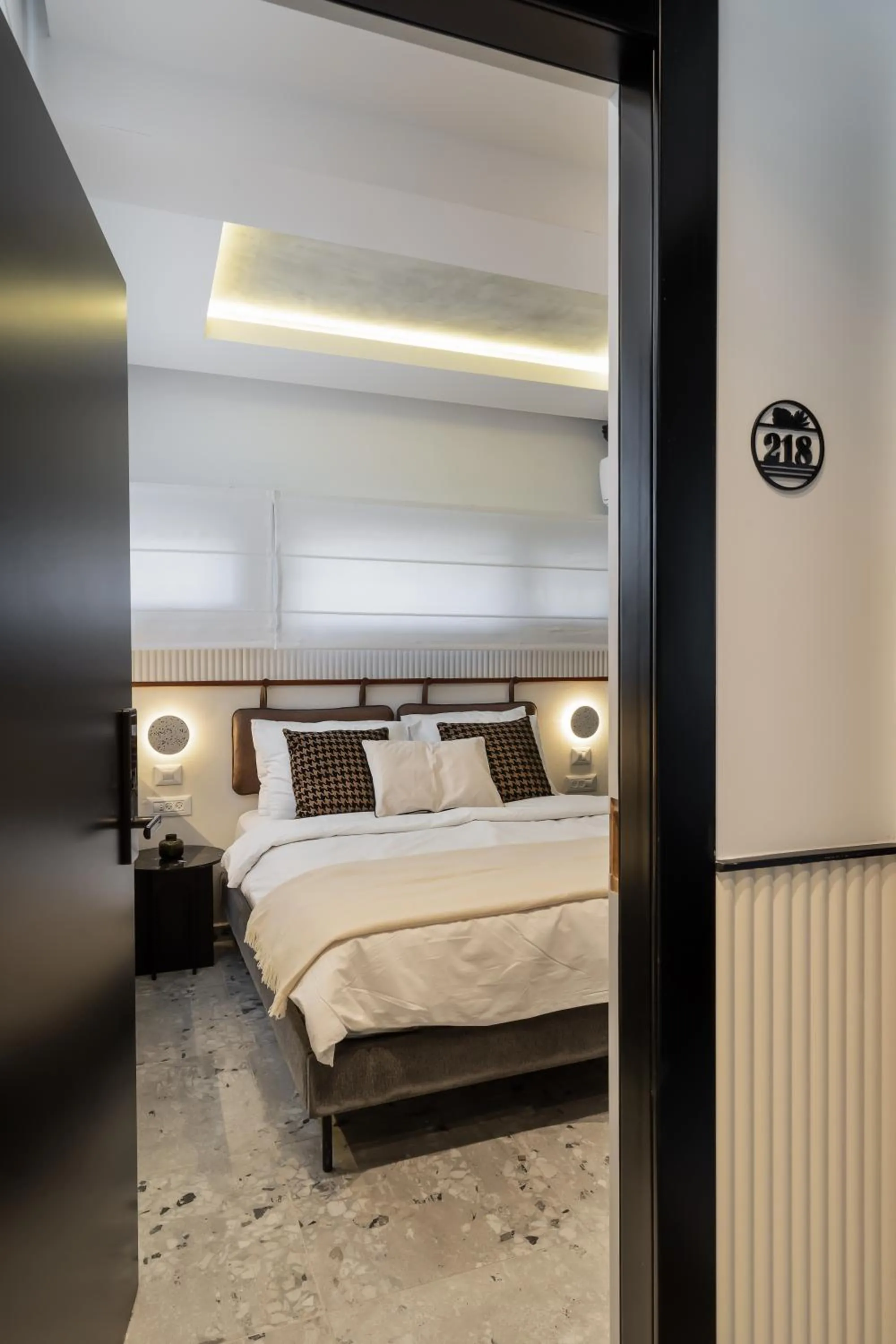 Bed in Mulan Hotel TLV