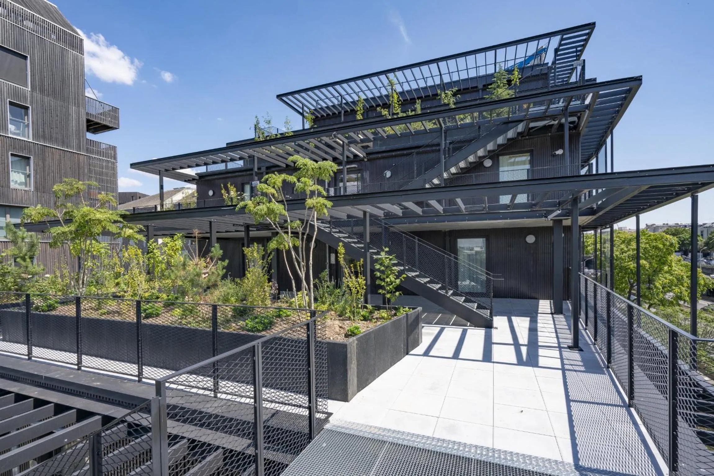 Property building in All Suites Appart Hôtel et Hôtel - Paris 13 - Porte d'Italie