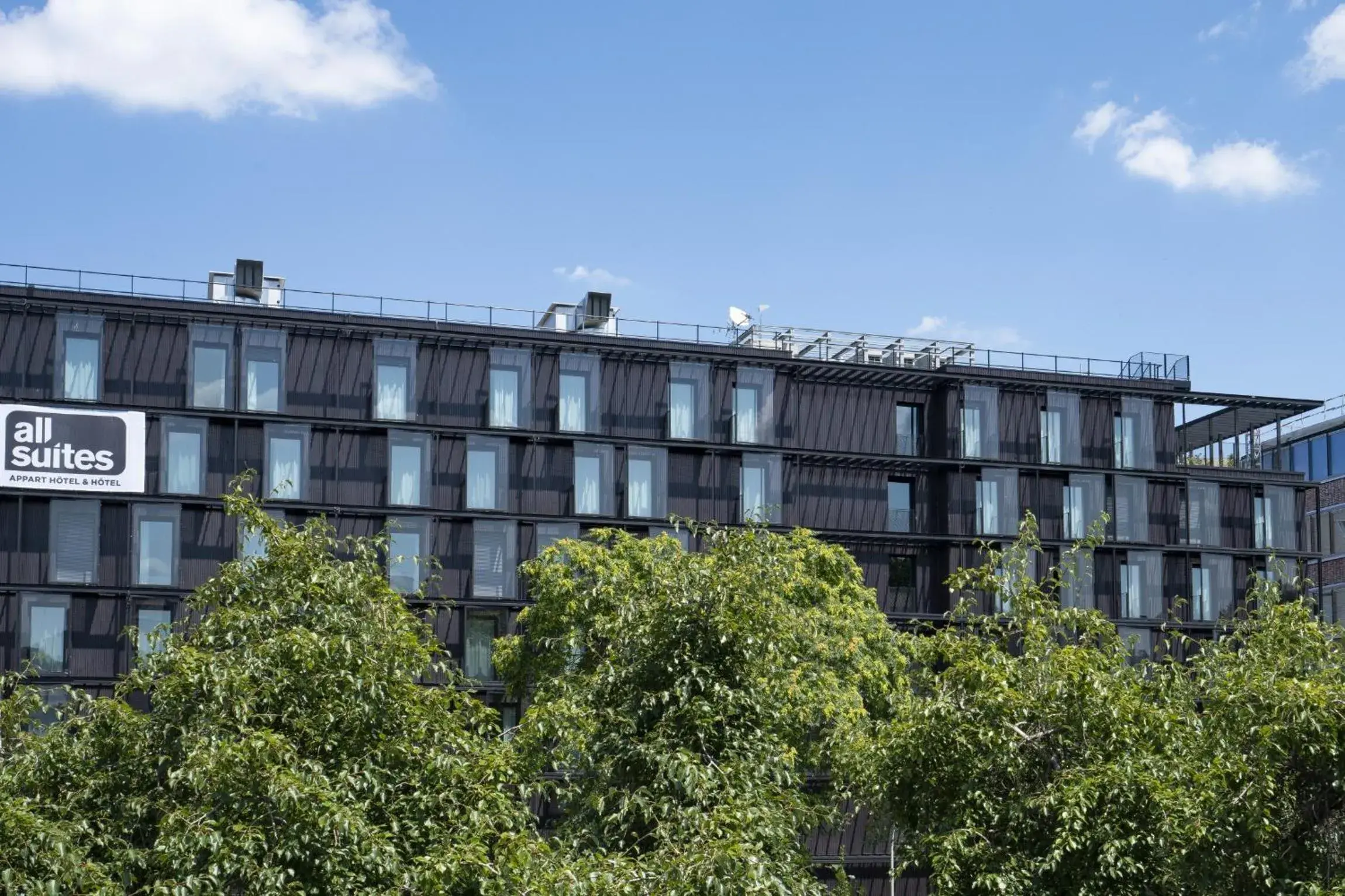 Property building in All Suites Appart Hôtel et Hôtel - Paris 13 - Porte d'Italie Property building in All Suites Appart Hôtel et Hôtel - Paris 13 - Porte d'Italie