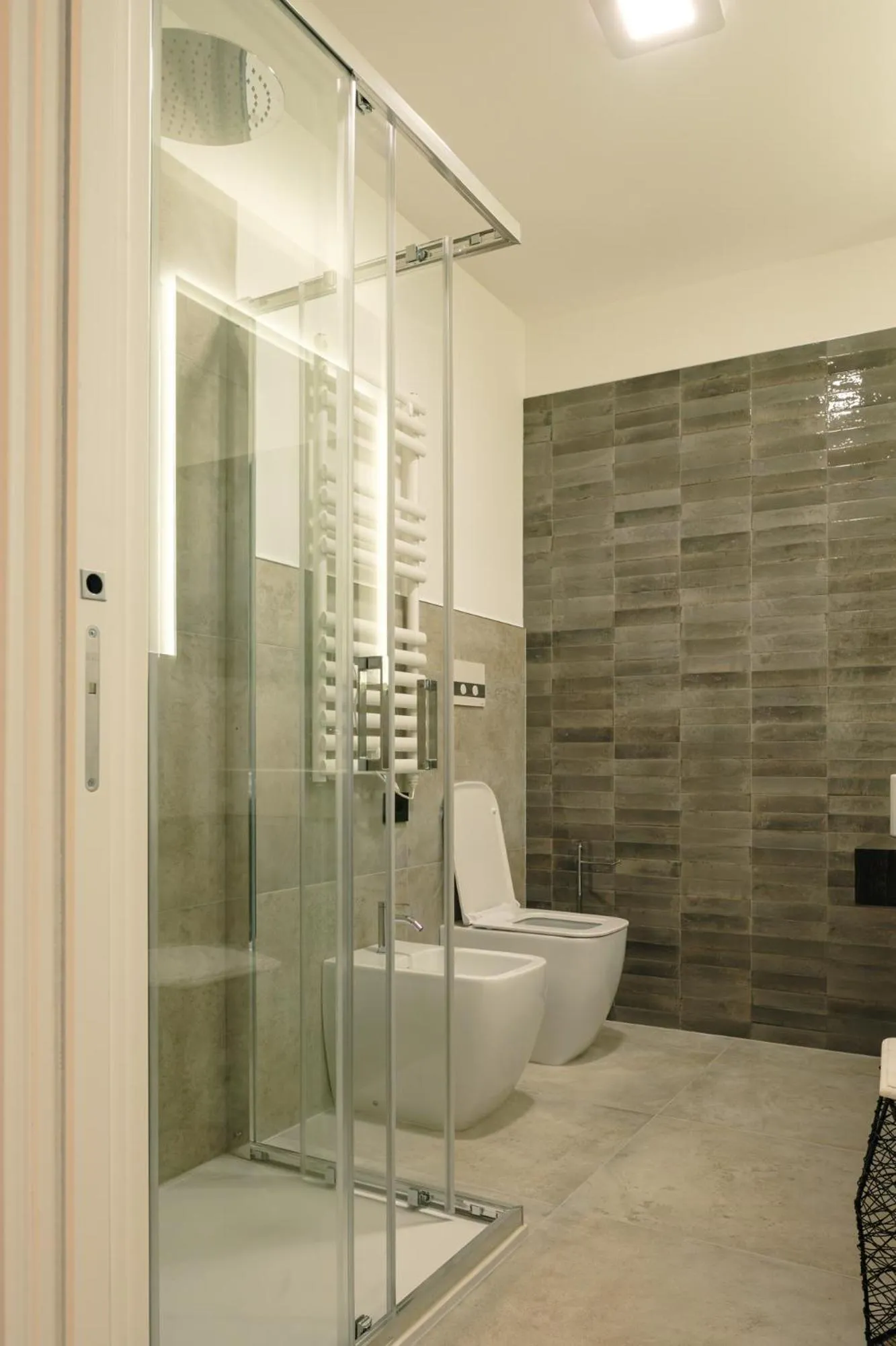 Bathroom in Camoma Aparthotel - Suites Apartments