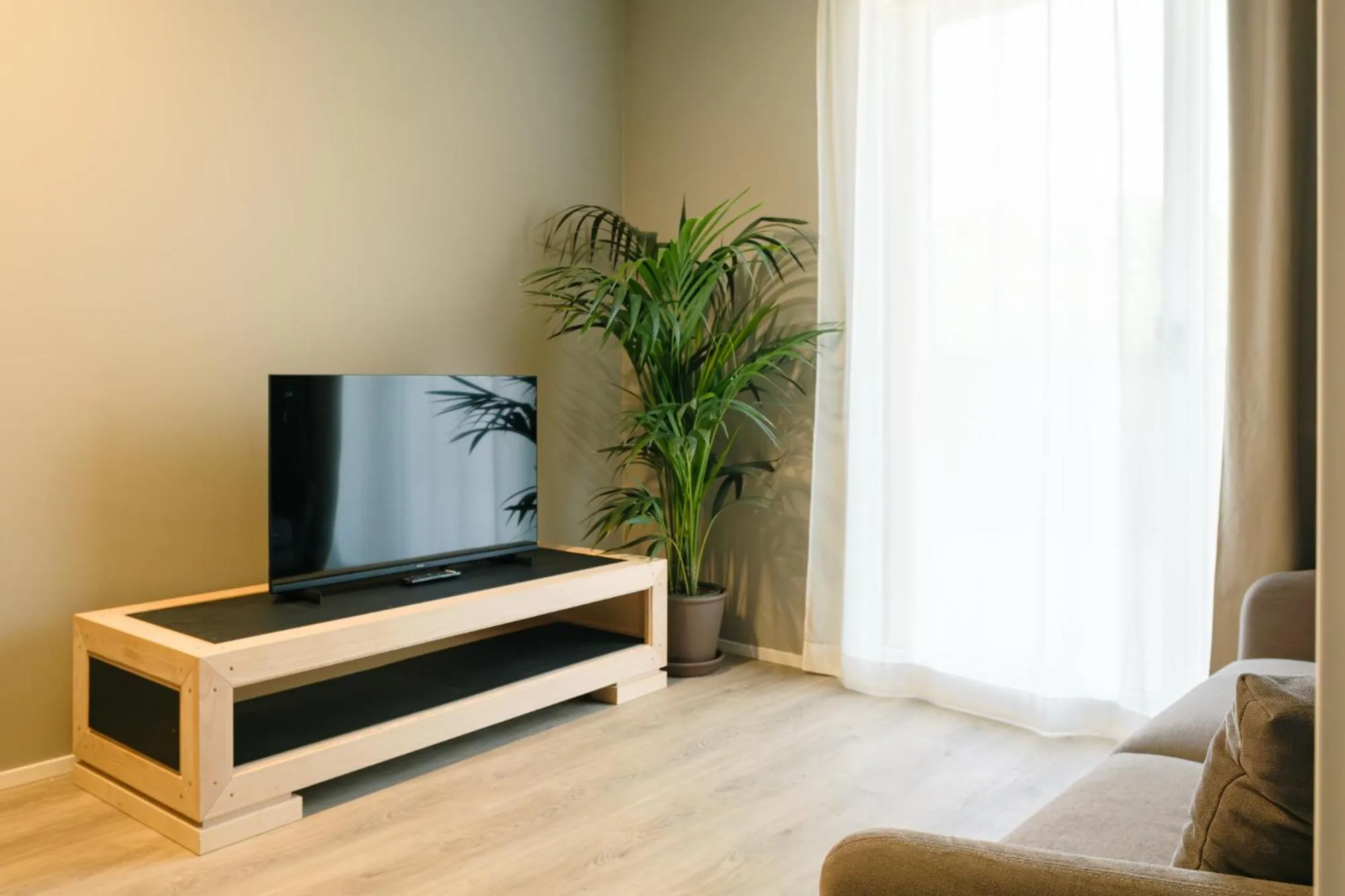 TV and multimedia in Camoma Aparthotel - Suites Apartments